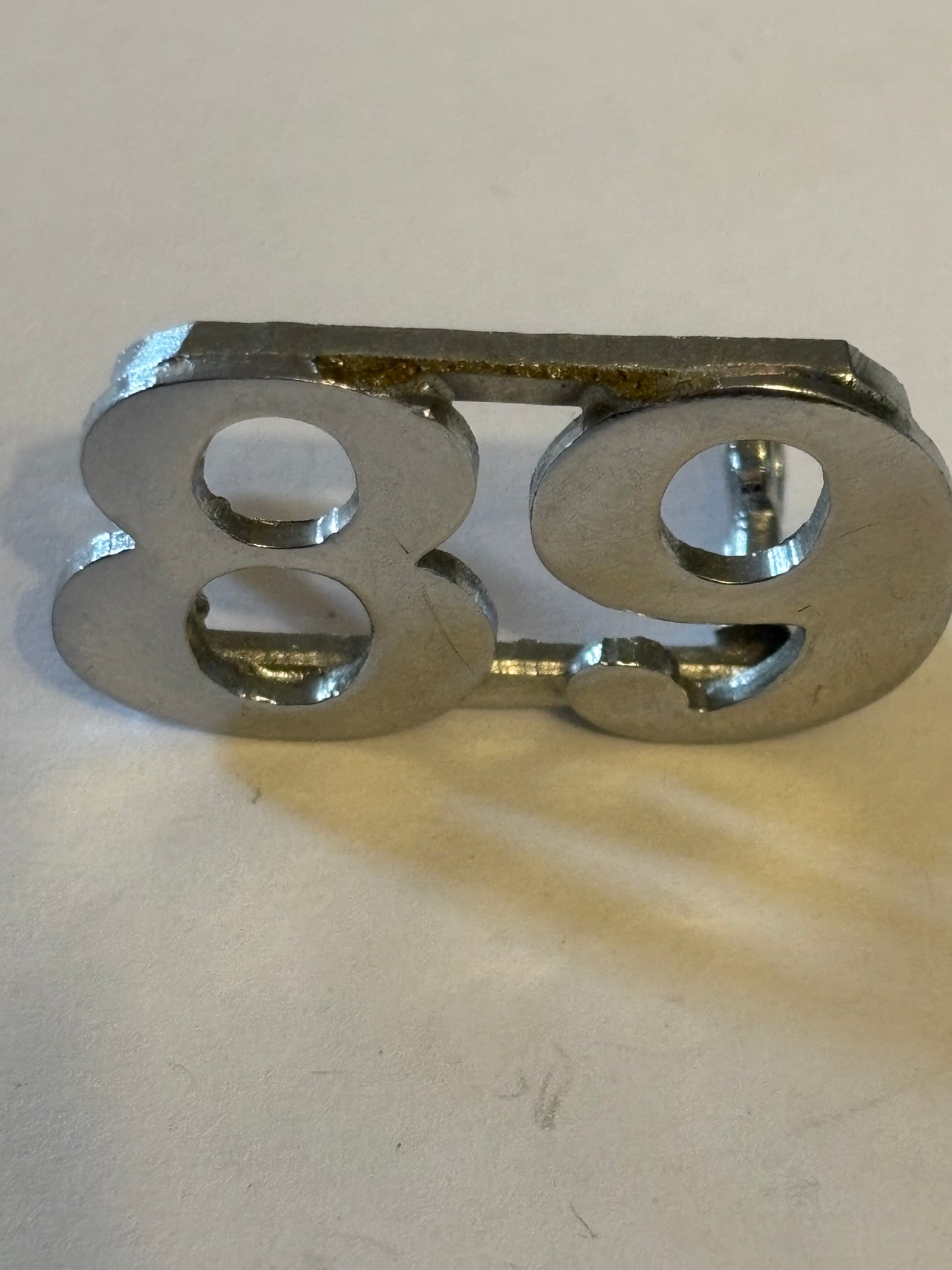 Silver metal 89 Uniform badge - Unknown origin