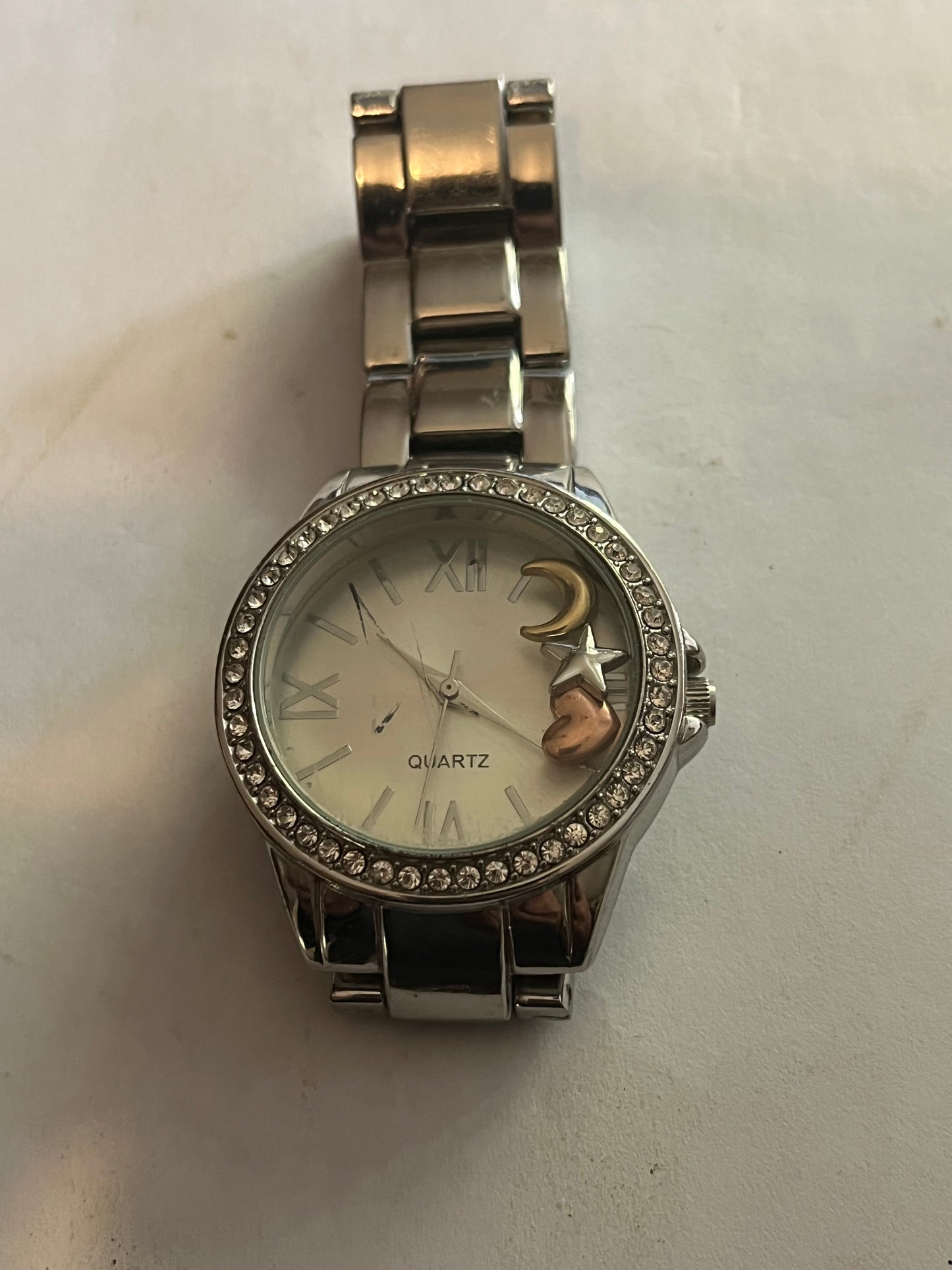 Thick silver jewelled AVON watch with loose charms - Untested