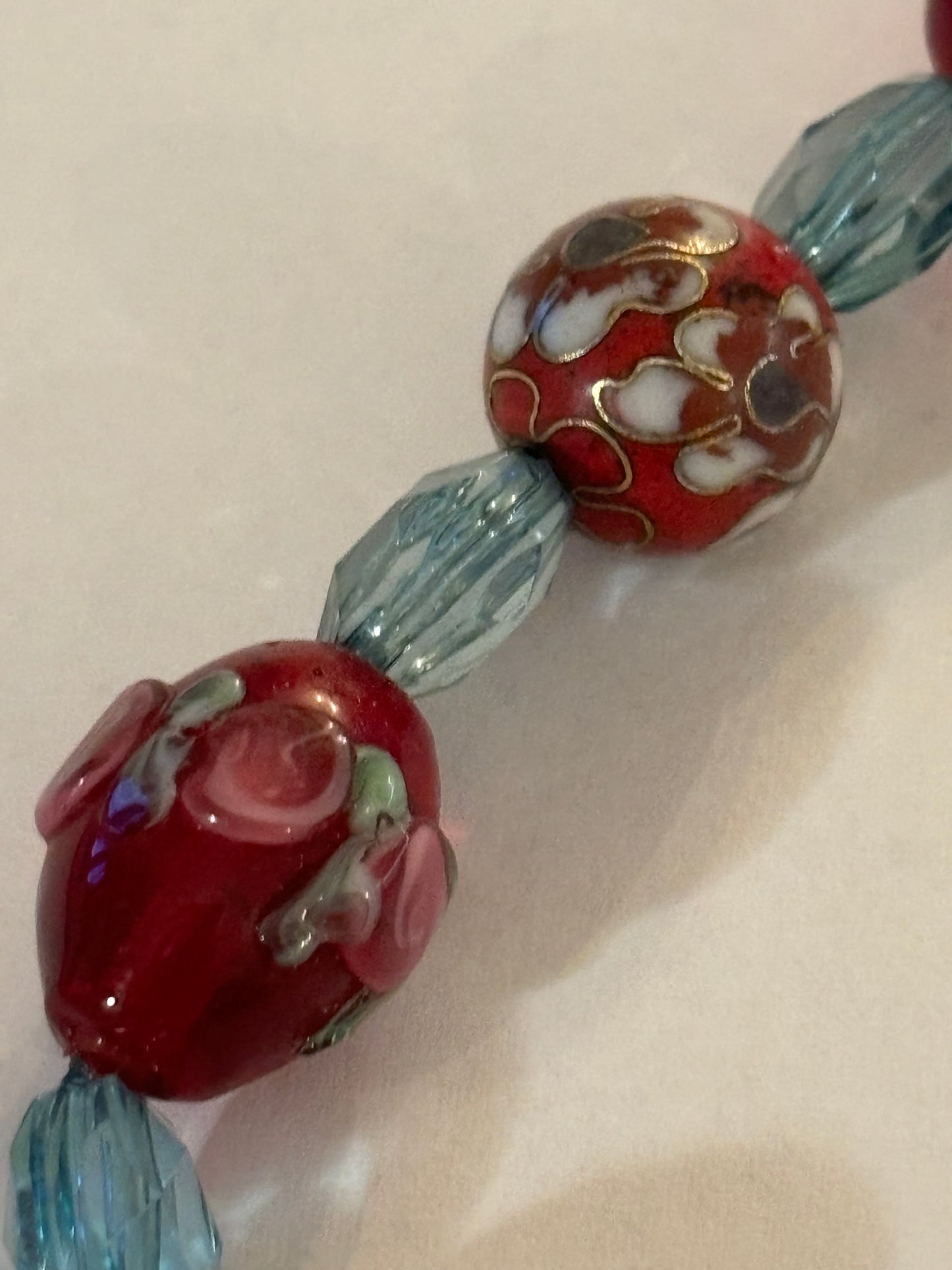 Decorative red and clear blue beaded T-Bar bracelet