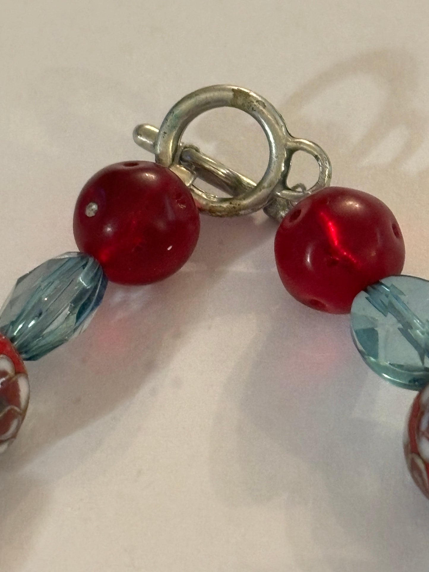 Decorative red and clear blue beaded T-Bar bracelet