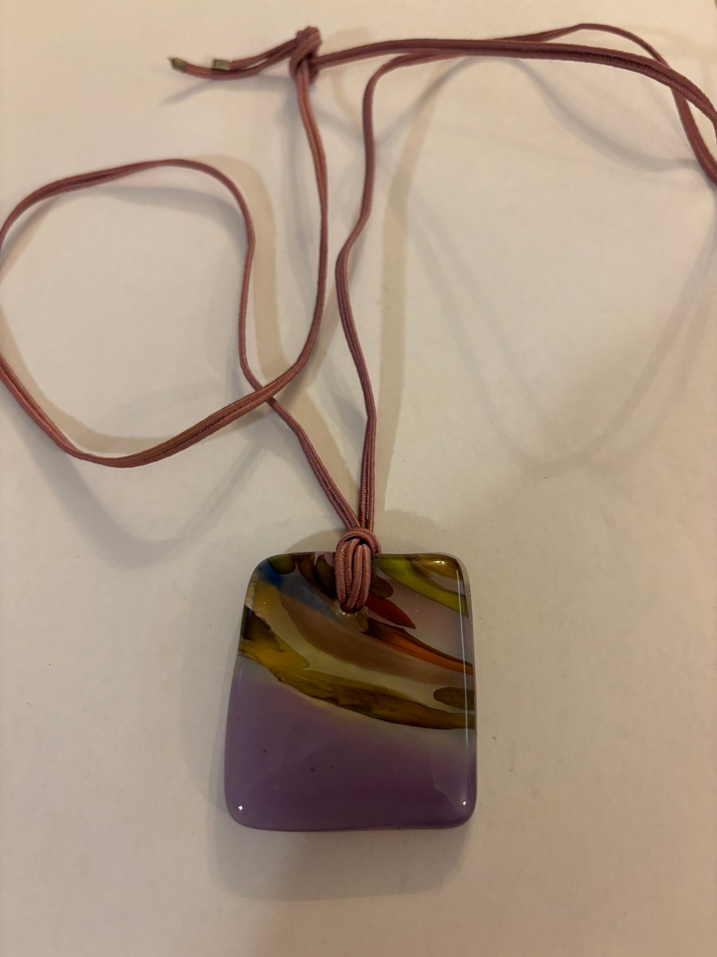 Double pink string necklace with square purple glass swirl pendant