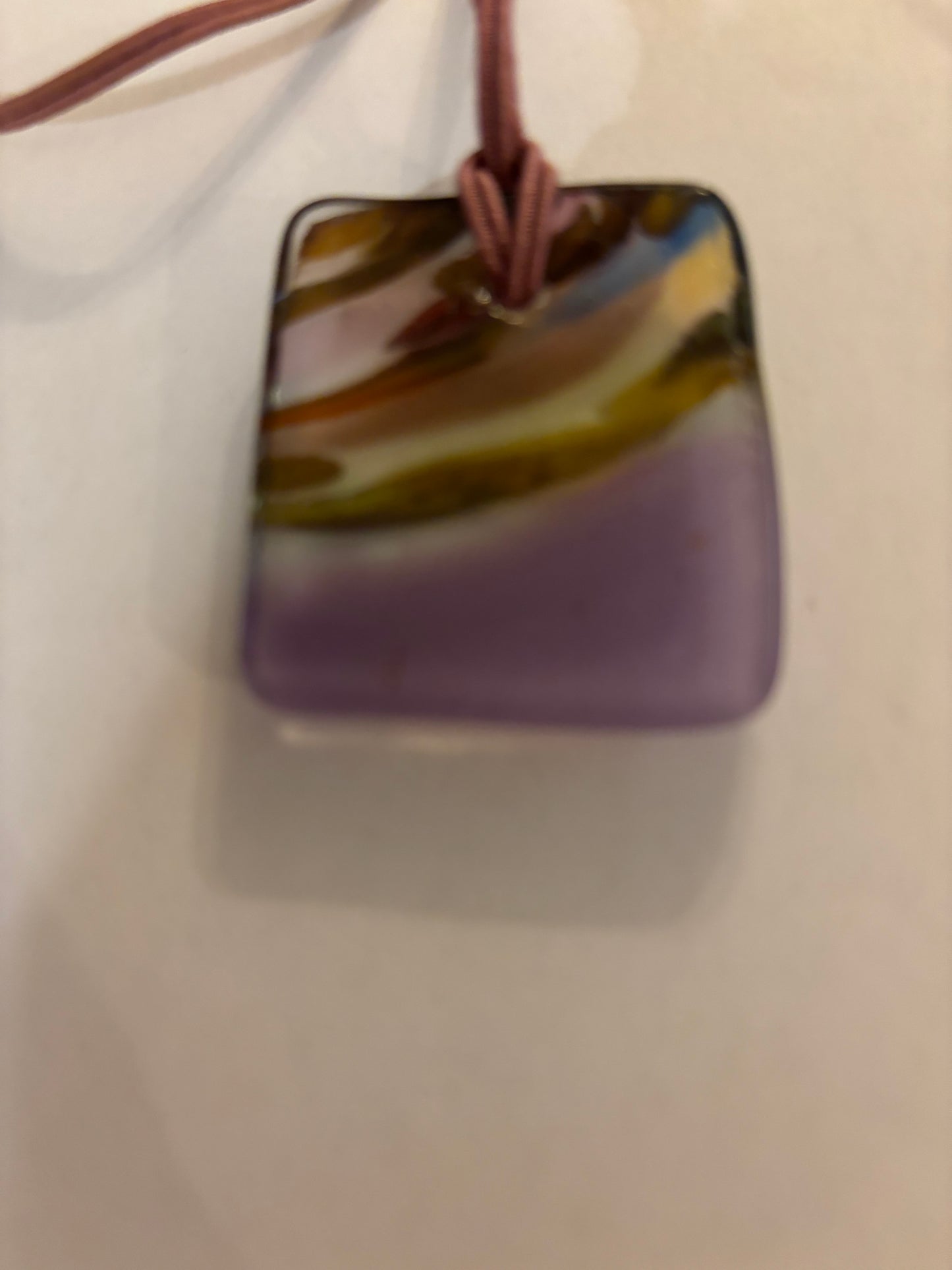 Double pink string necklace with square purple glass swirl pendant