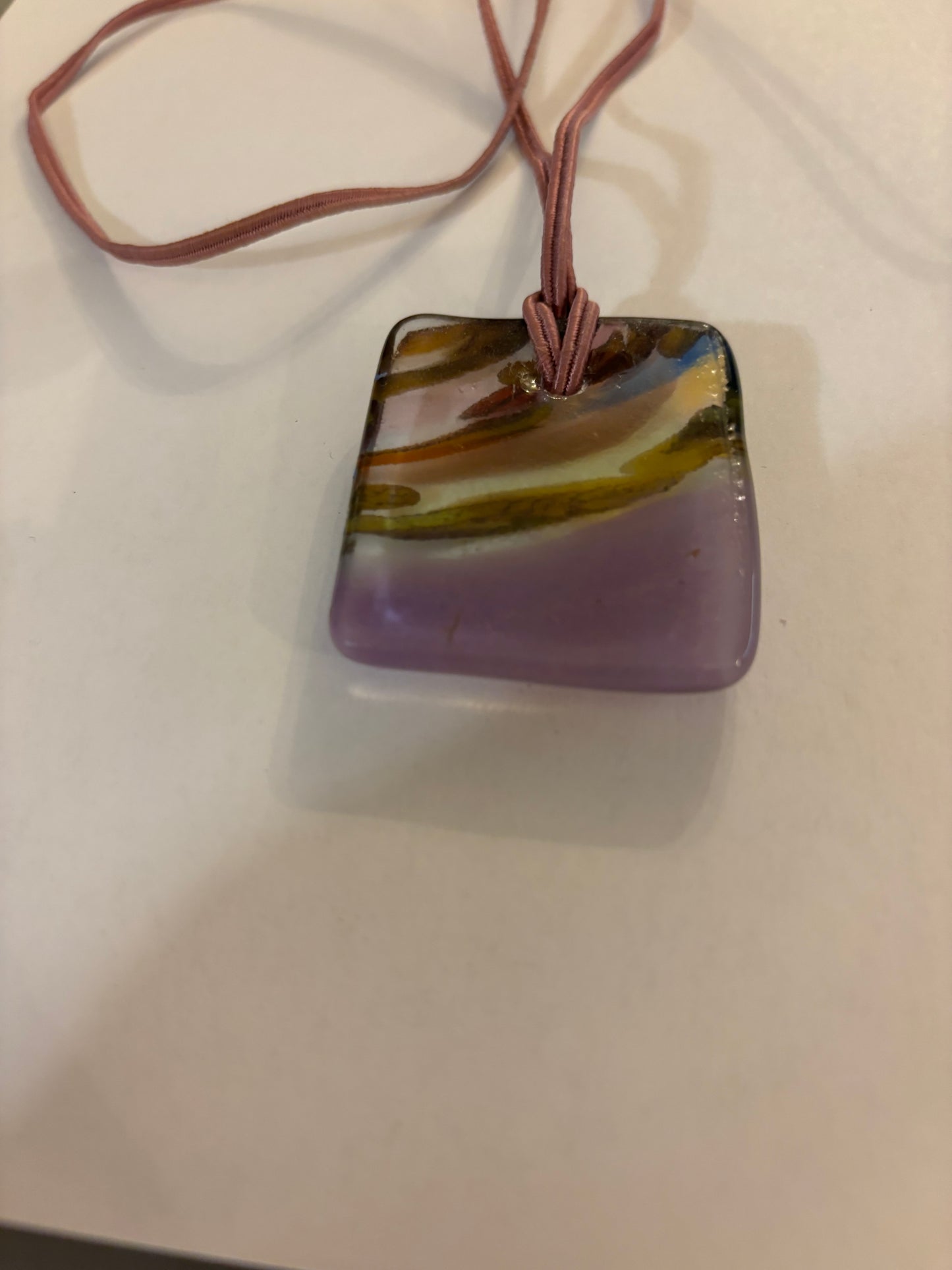 Double pink string necklace with square purple glass swirl pendant