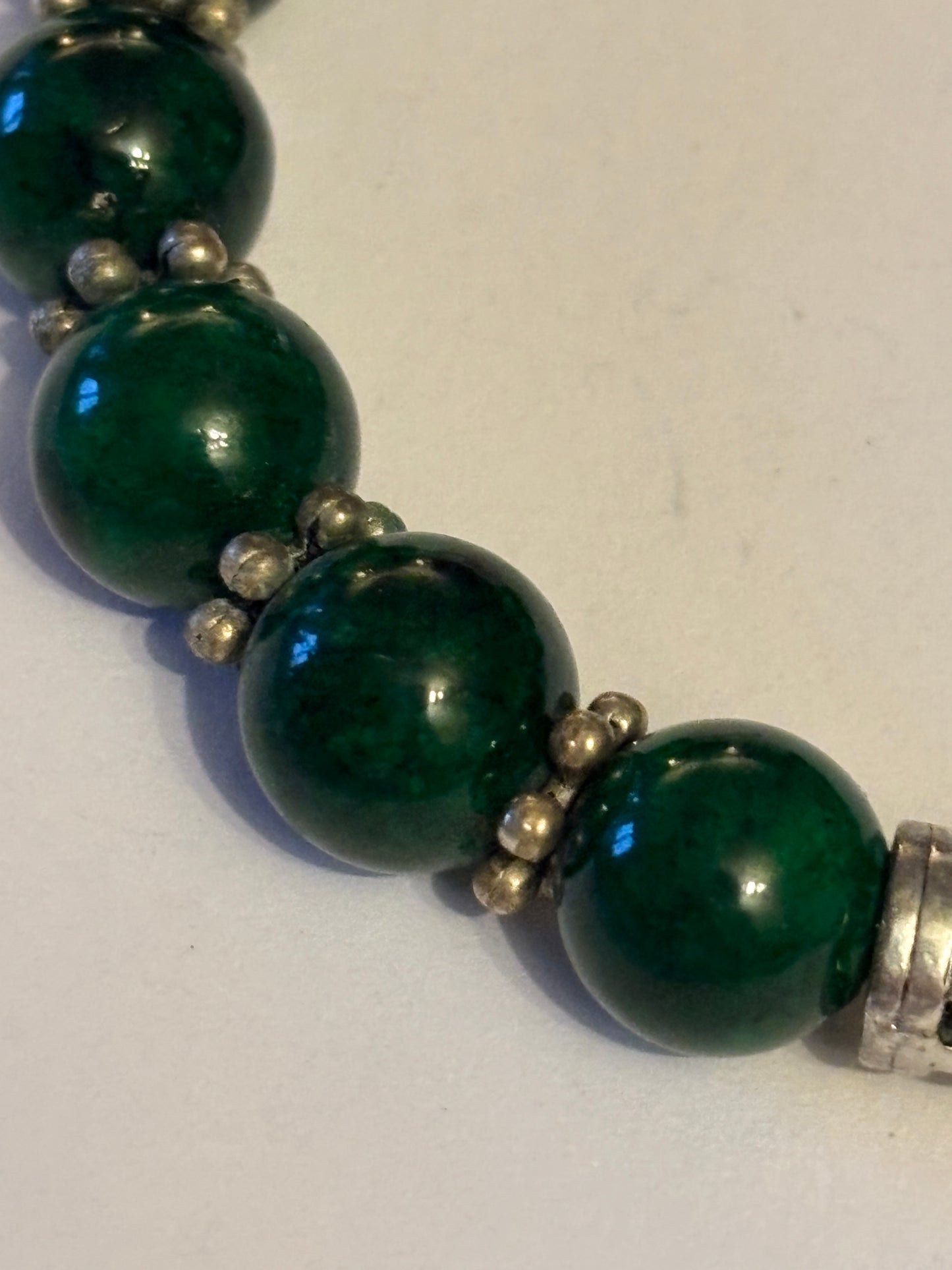 Dark green and silver decorative bead bracelet