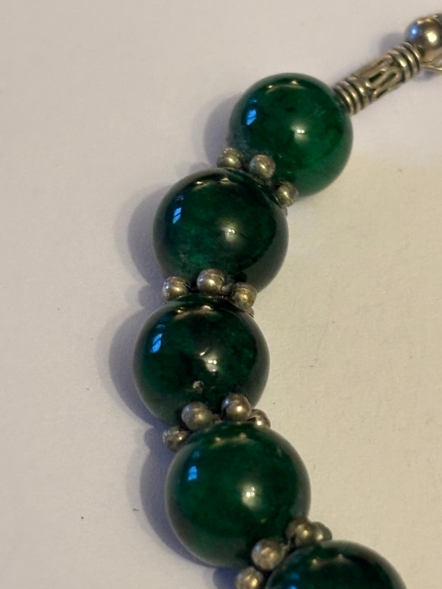 Dark green and silver decorative bead bracelet