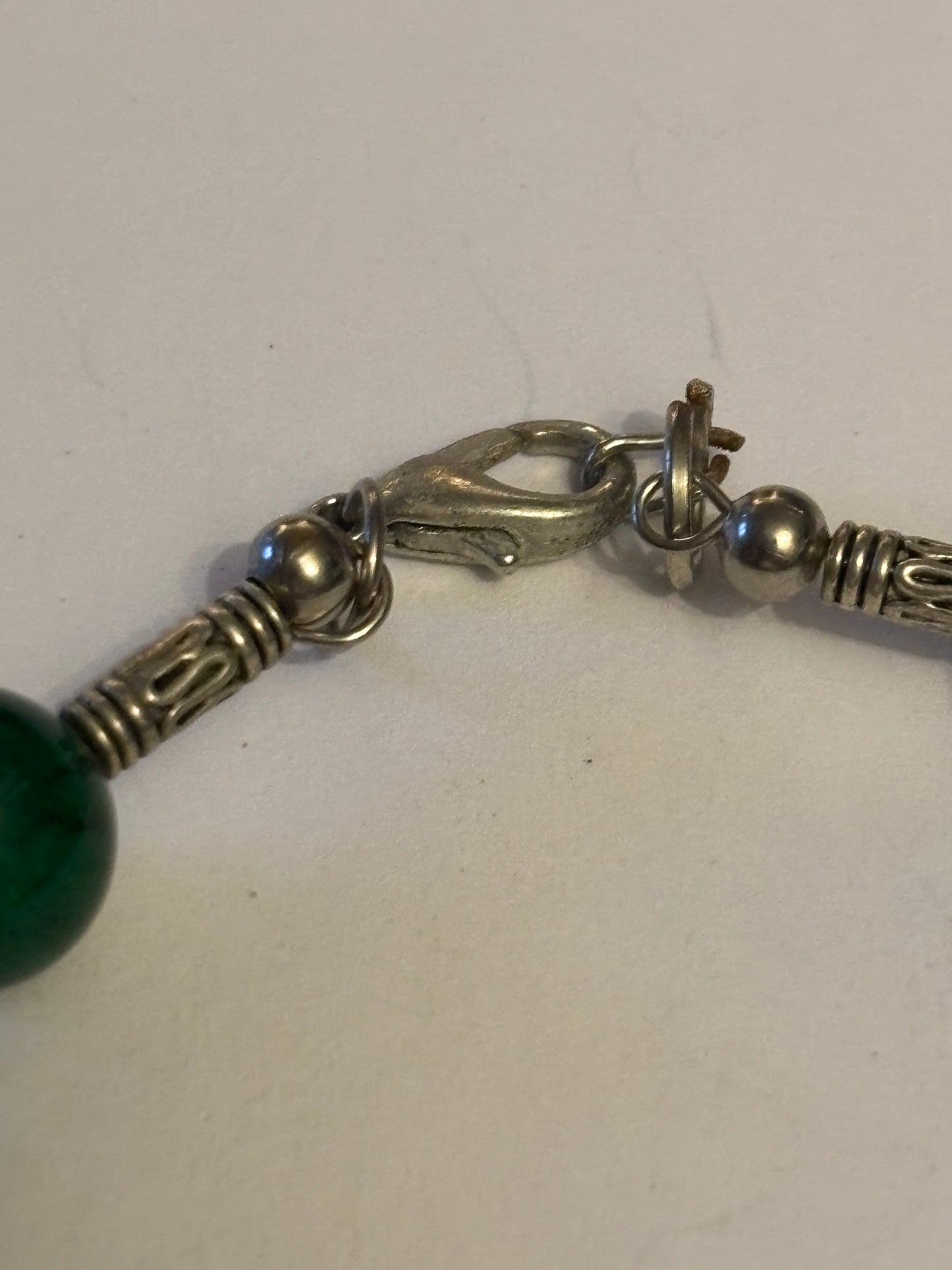 Dark green and silver decorative bead bracelet