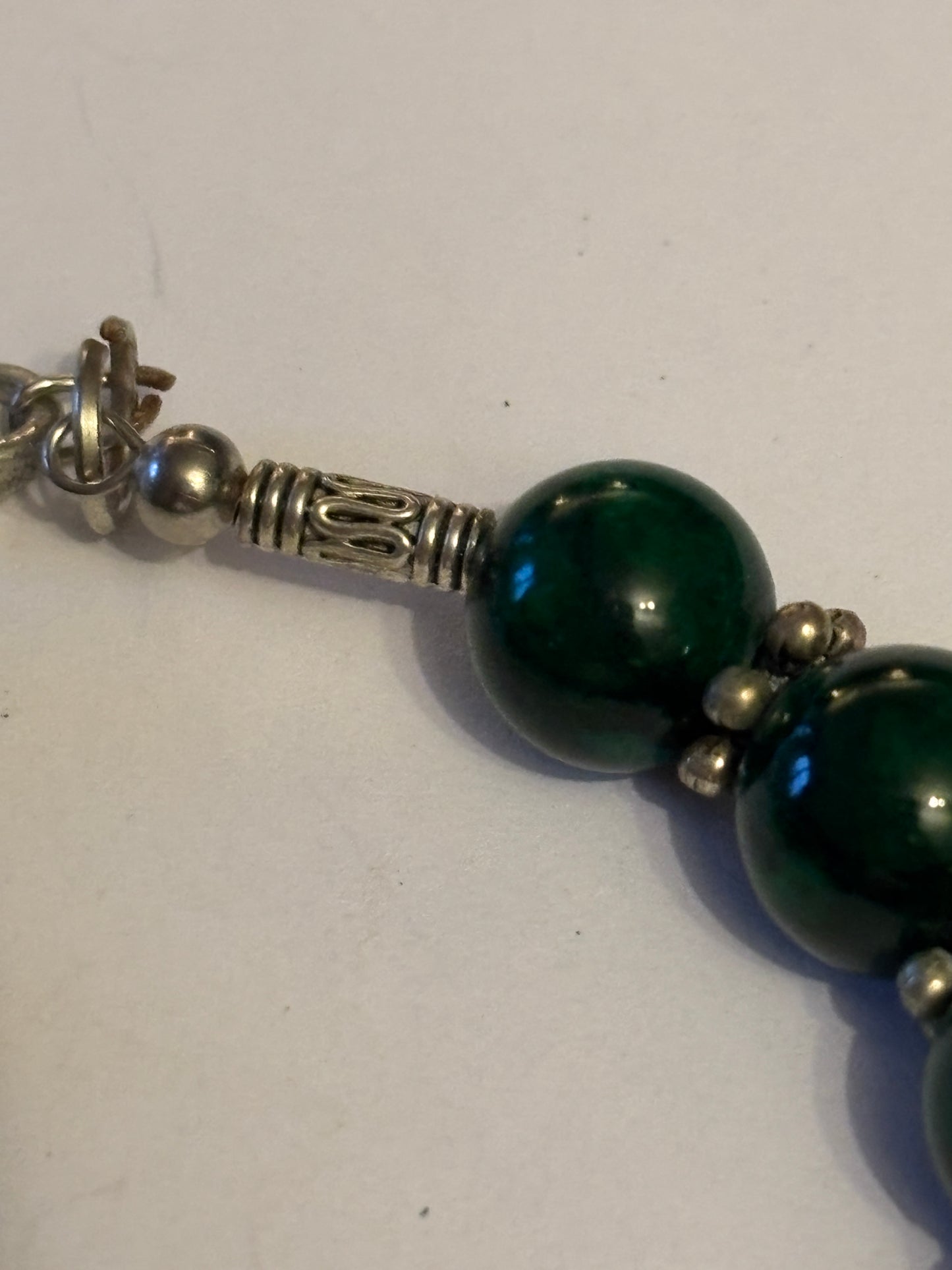 Dark green and silver decorative bead bracelet