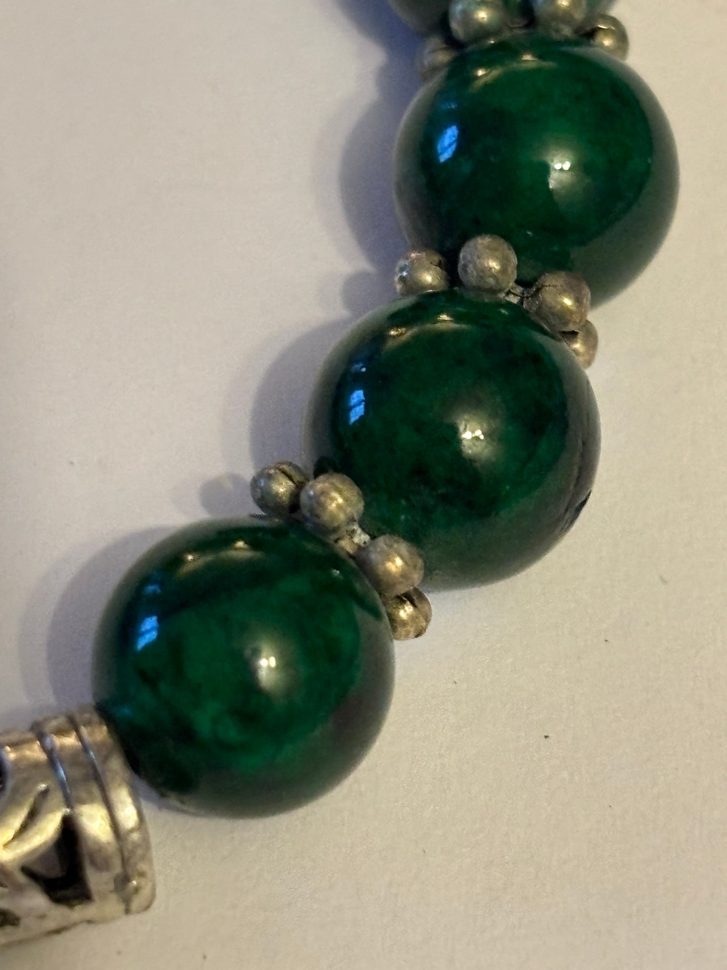 Dark green and silver decorative bead bracelet