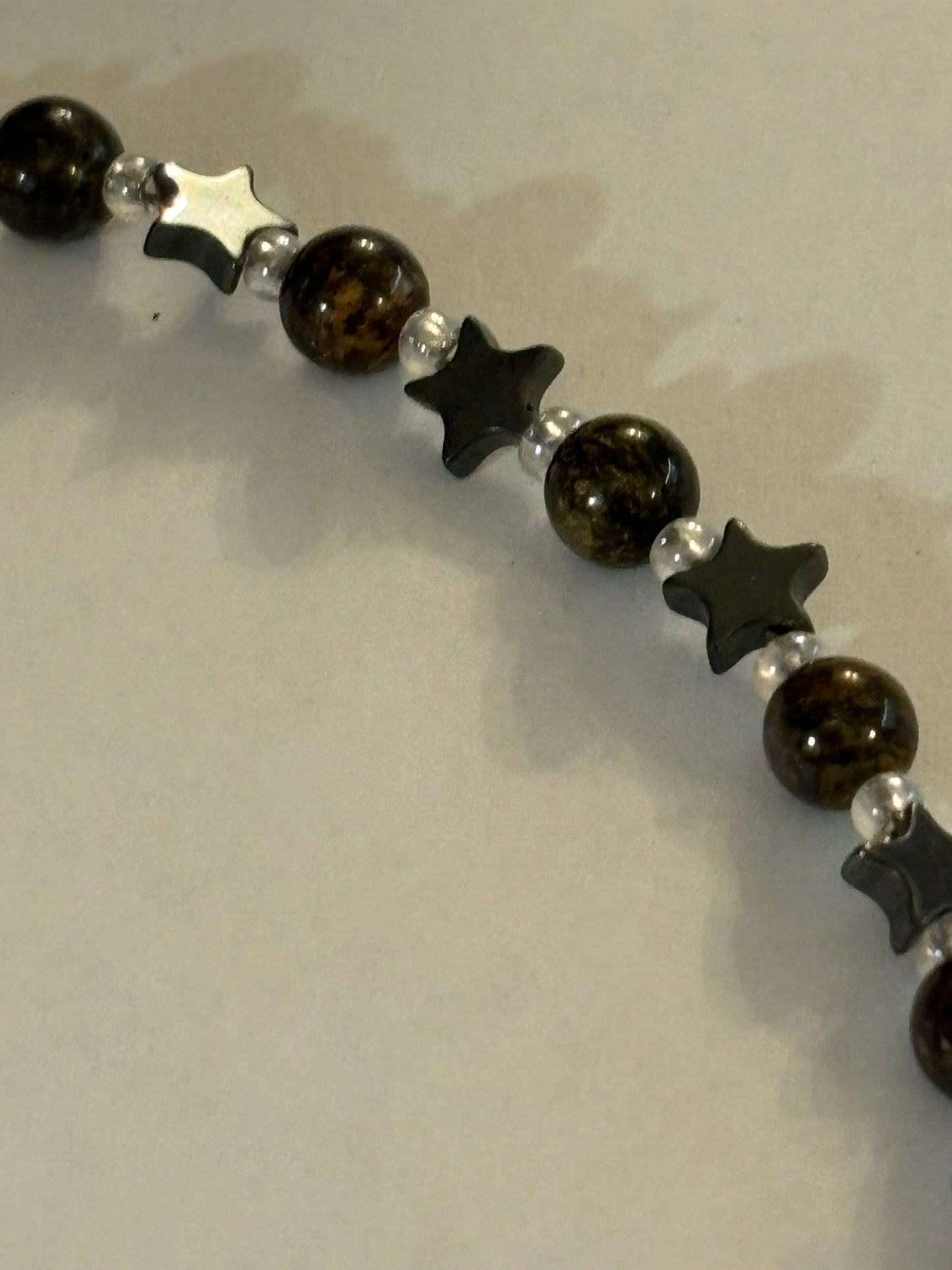 Dark stars and beads alternating T-bar necklace