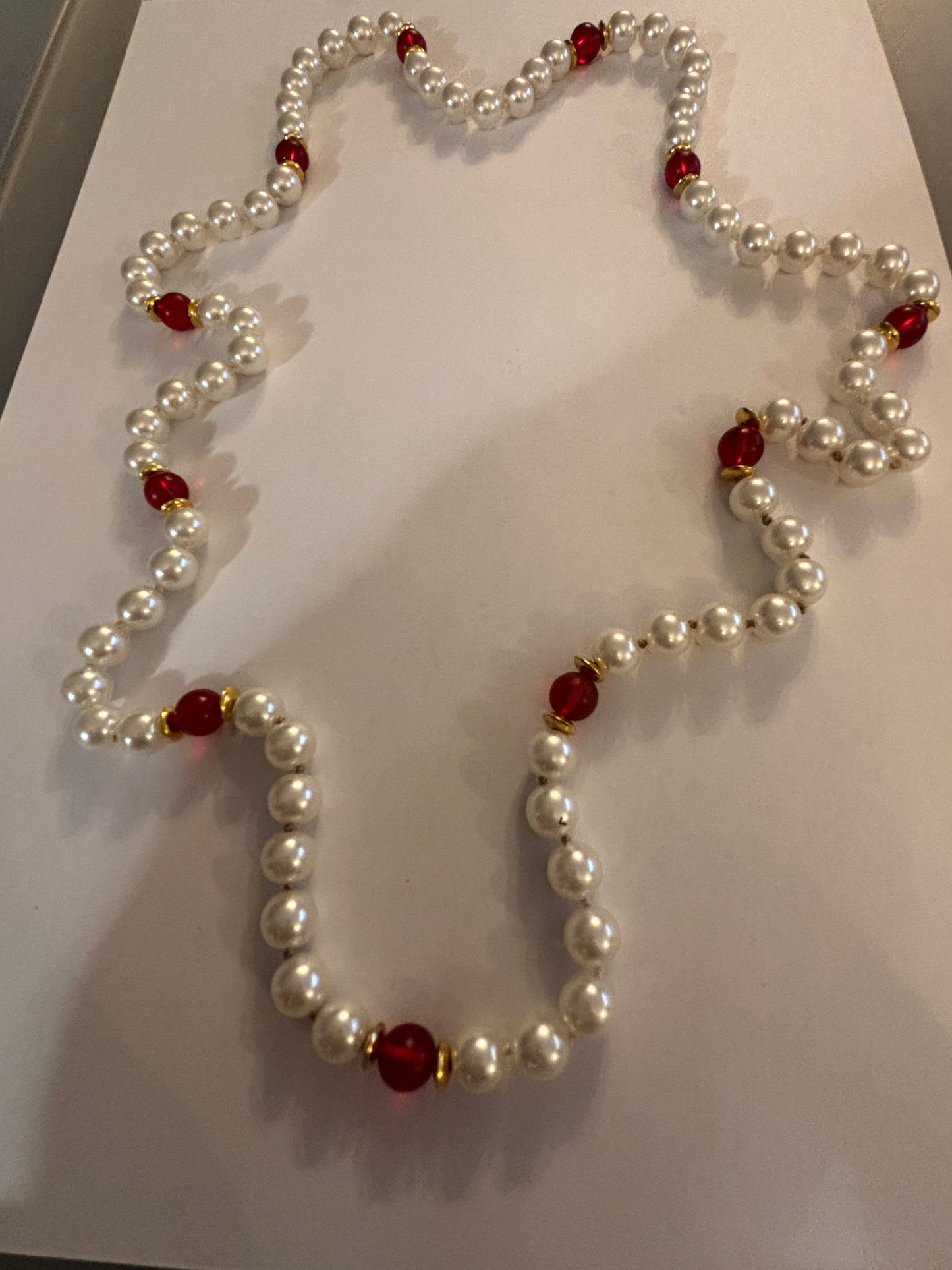 Large pearl style necklace with red bead spacers