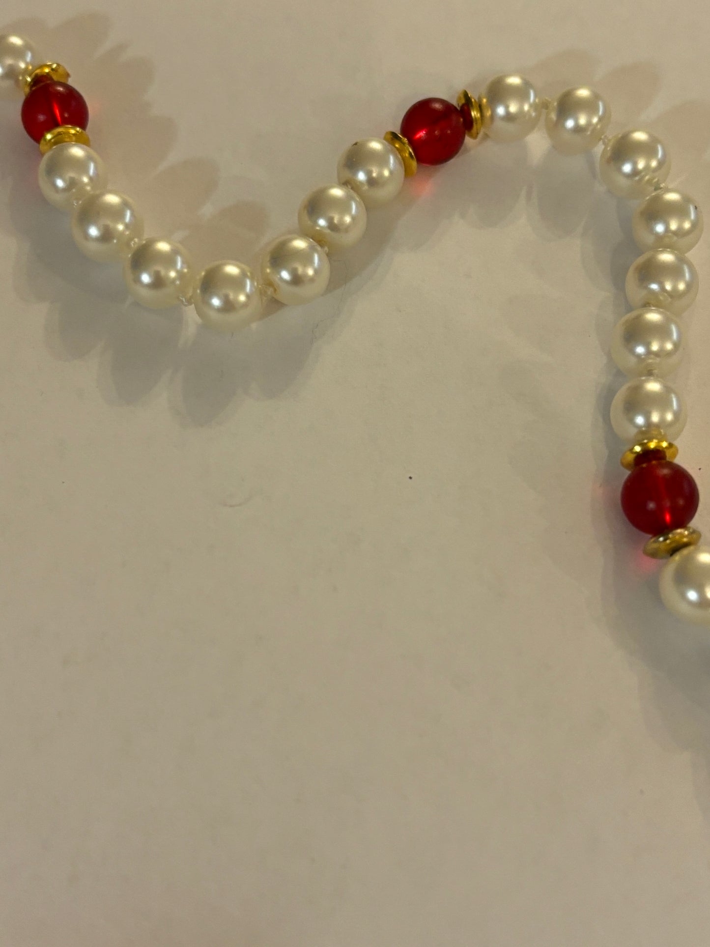 Large pearl style necklace with red bead spacers