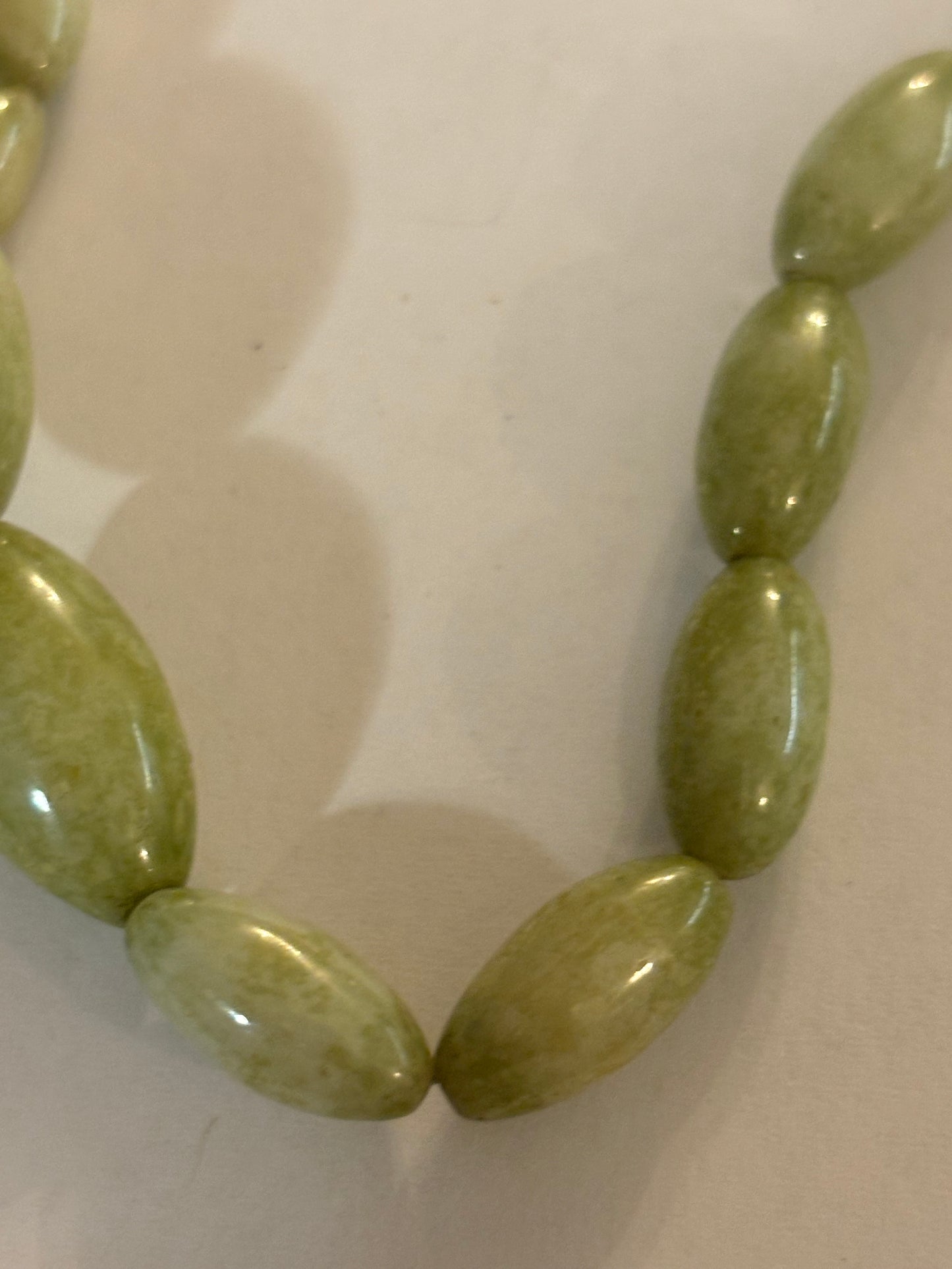 Long green swirl oval bead necklace and bracelet set