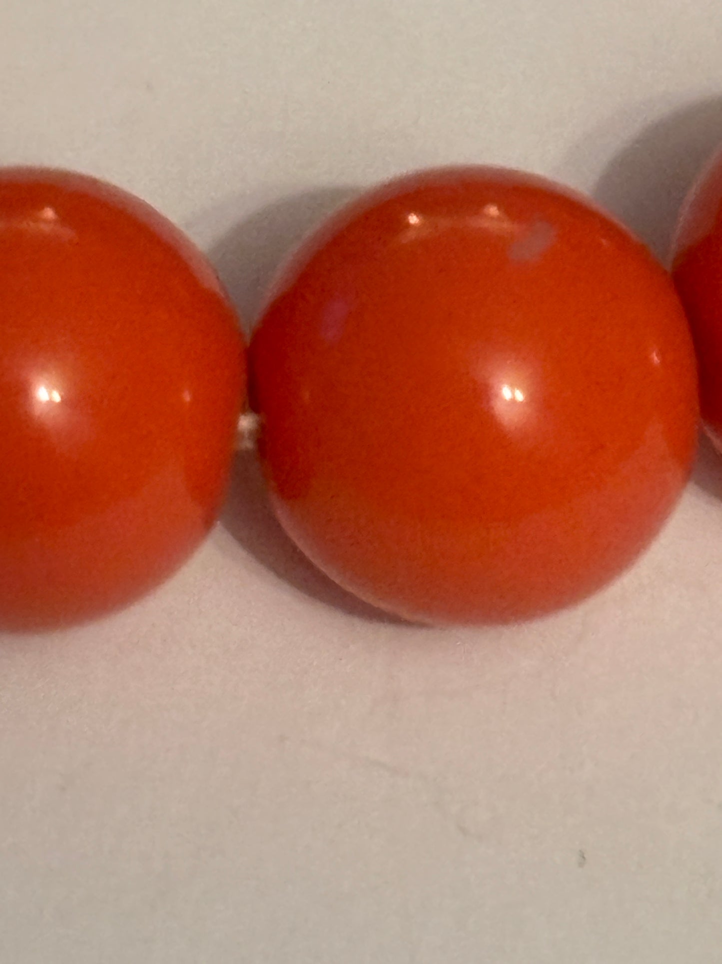 Bright round orange bead bracelet