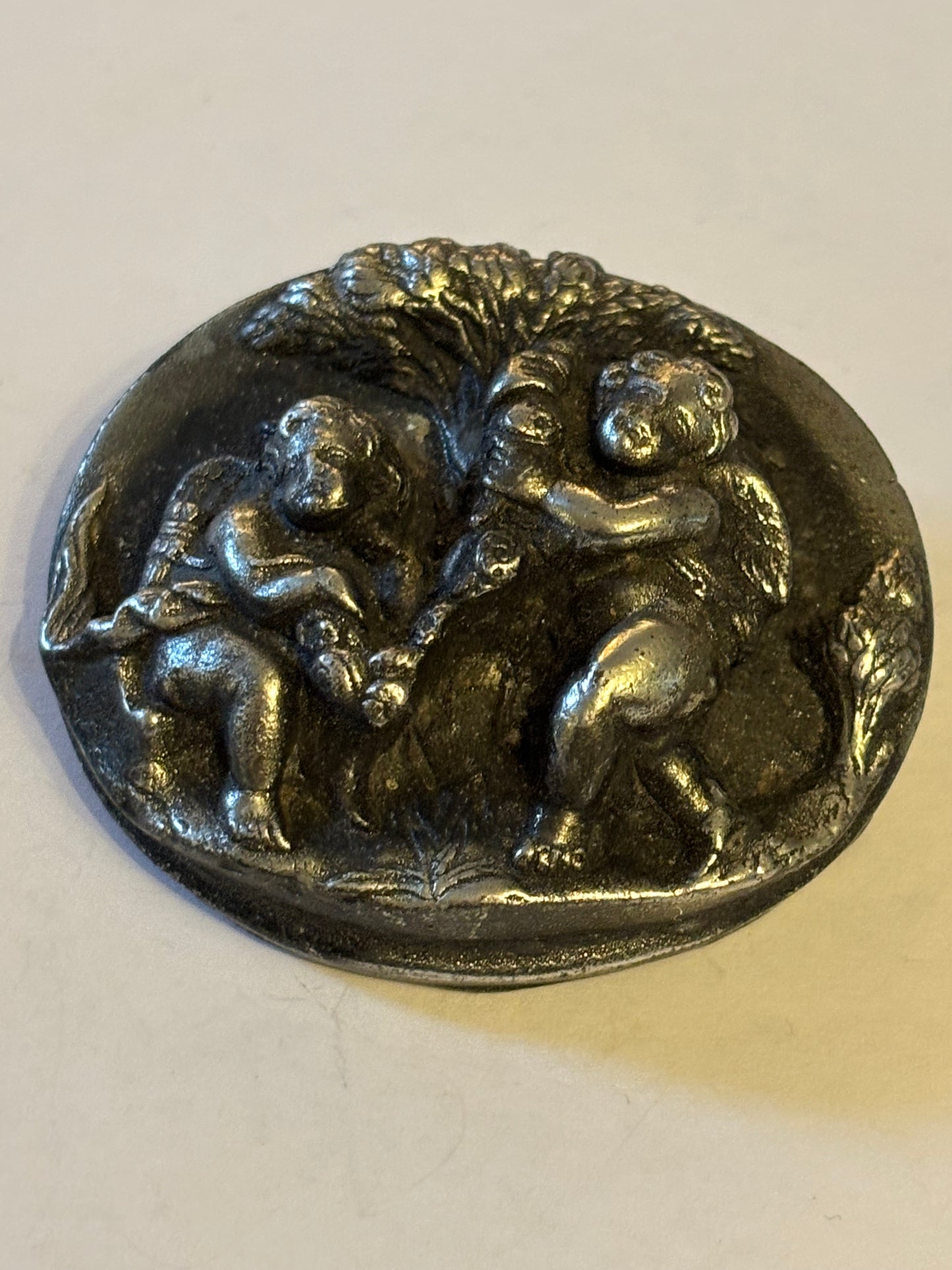 Unusual dark silver large cherub brooch