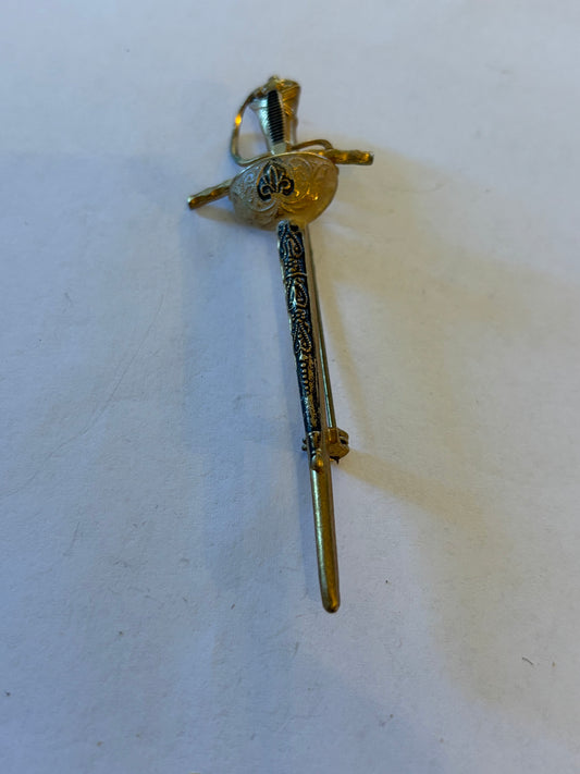 Vintage gold metal sword brooch