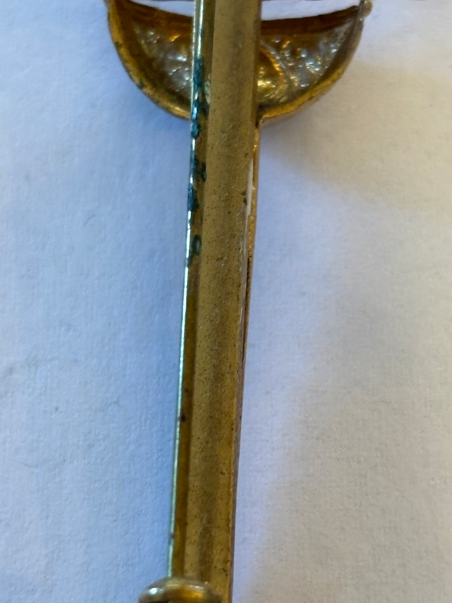 Vintage gold metal sword brooch