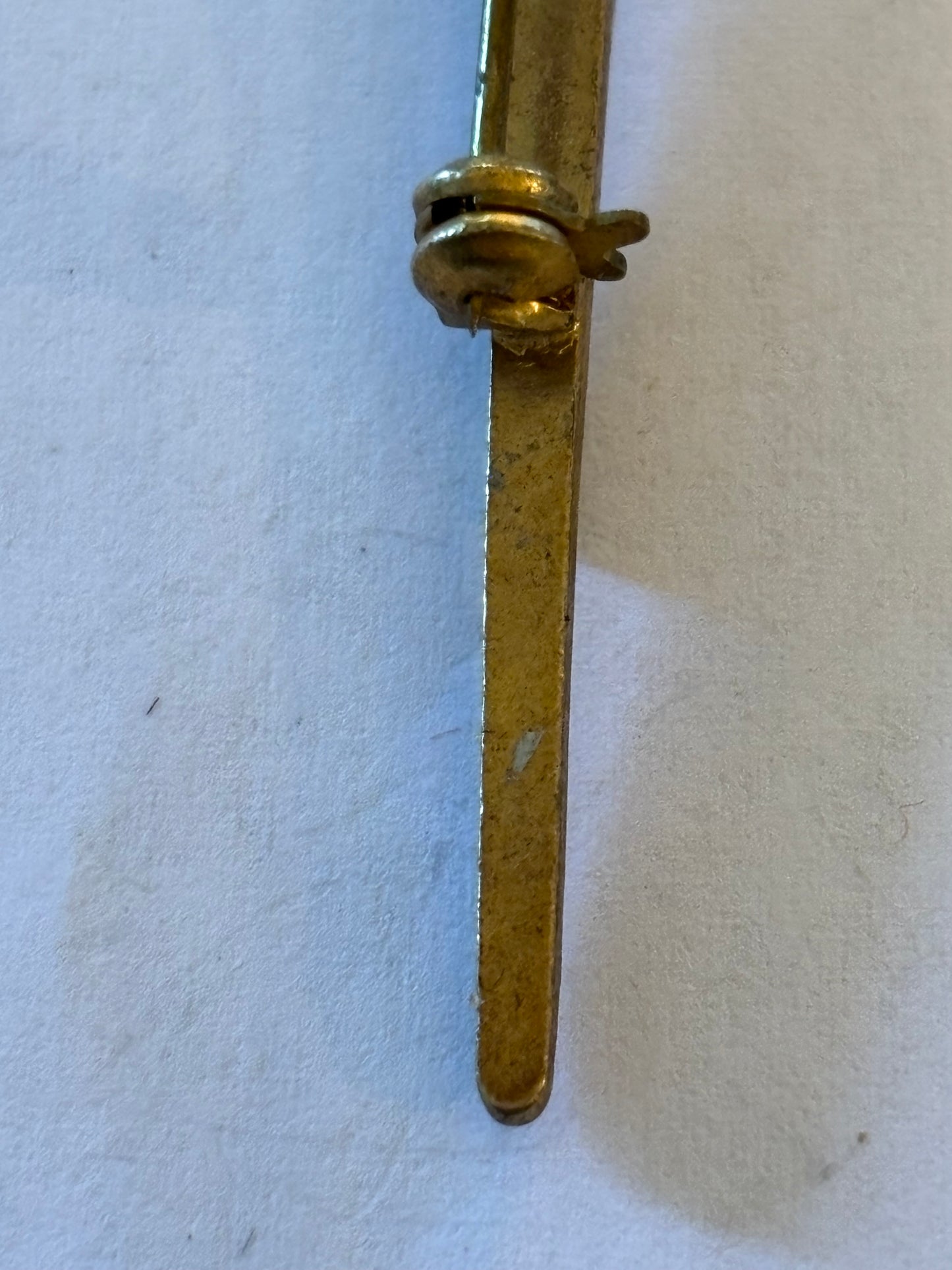 Vintage gold metal sword brooch