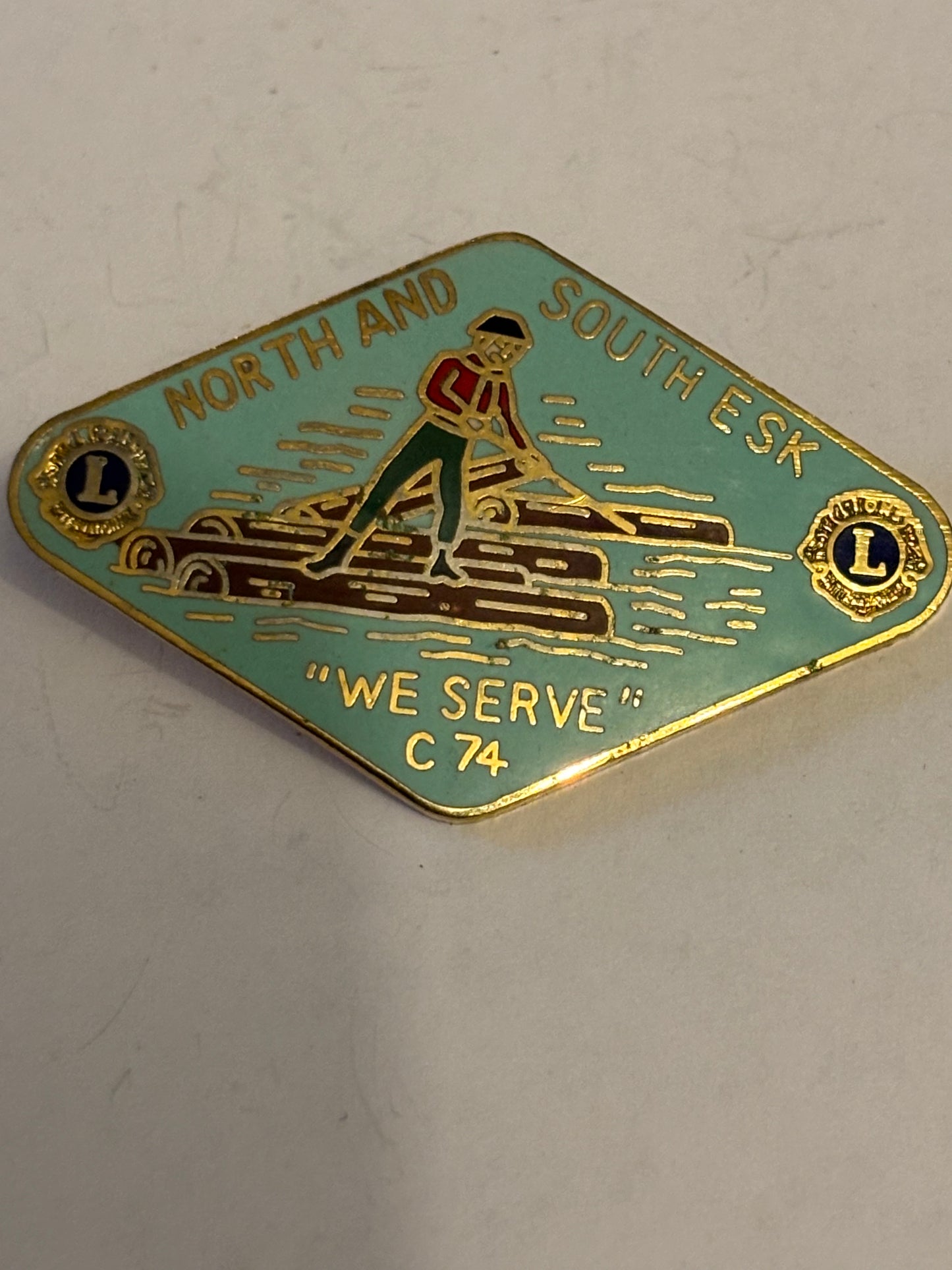 Lions Club - North and South ESK - We Serve badge - Rare