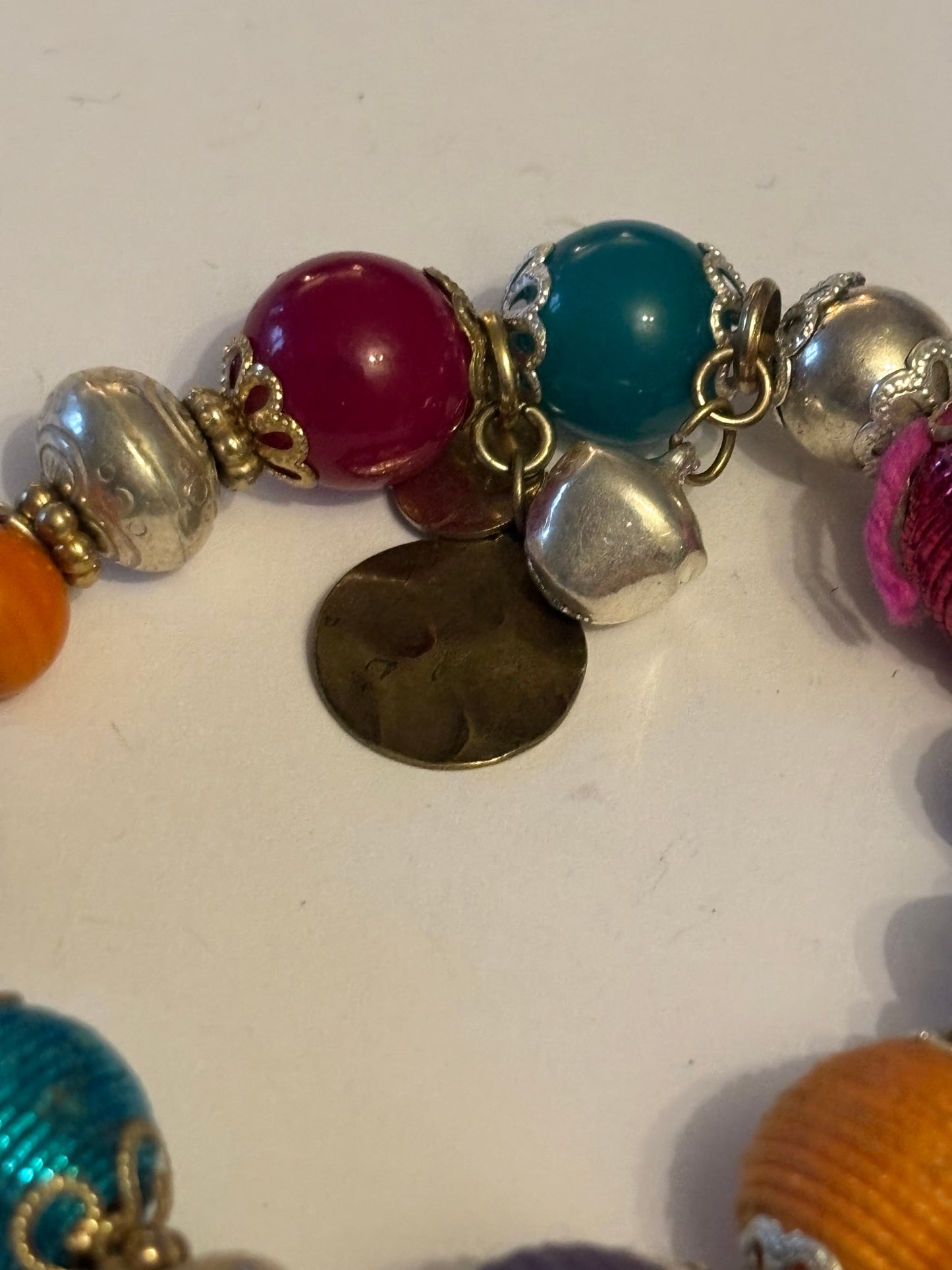 Decorative silver and coloured bead bracelet