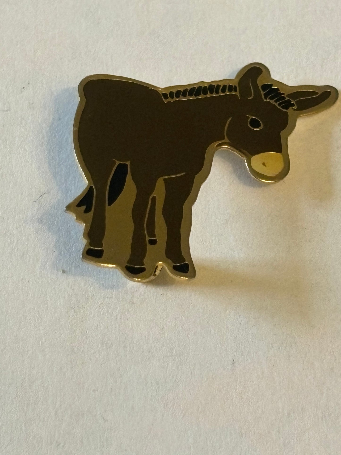 Brown Donkey Badge on gold metal