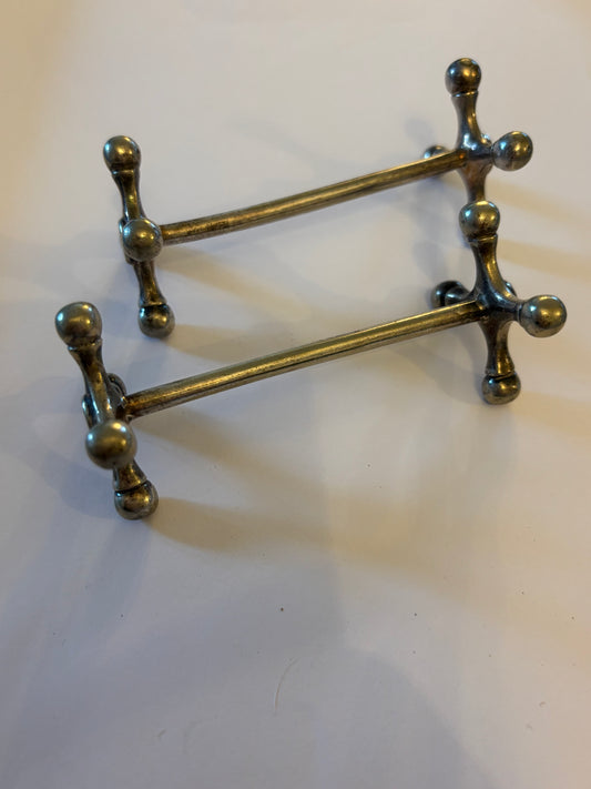 Pair of silver plated vintage knife rests