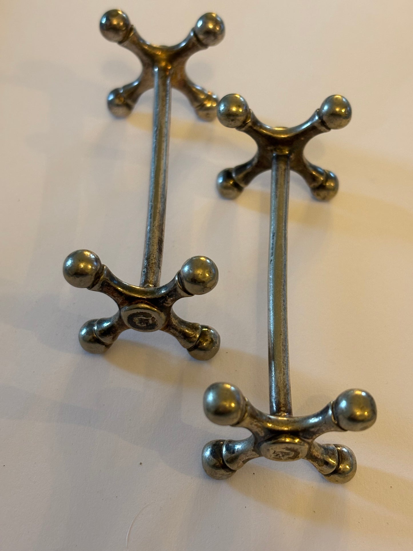 Pair of silver plated vintage knife rests