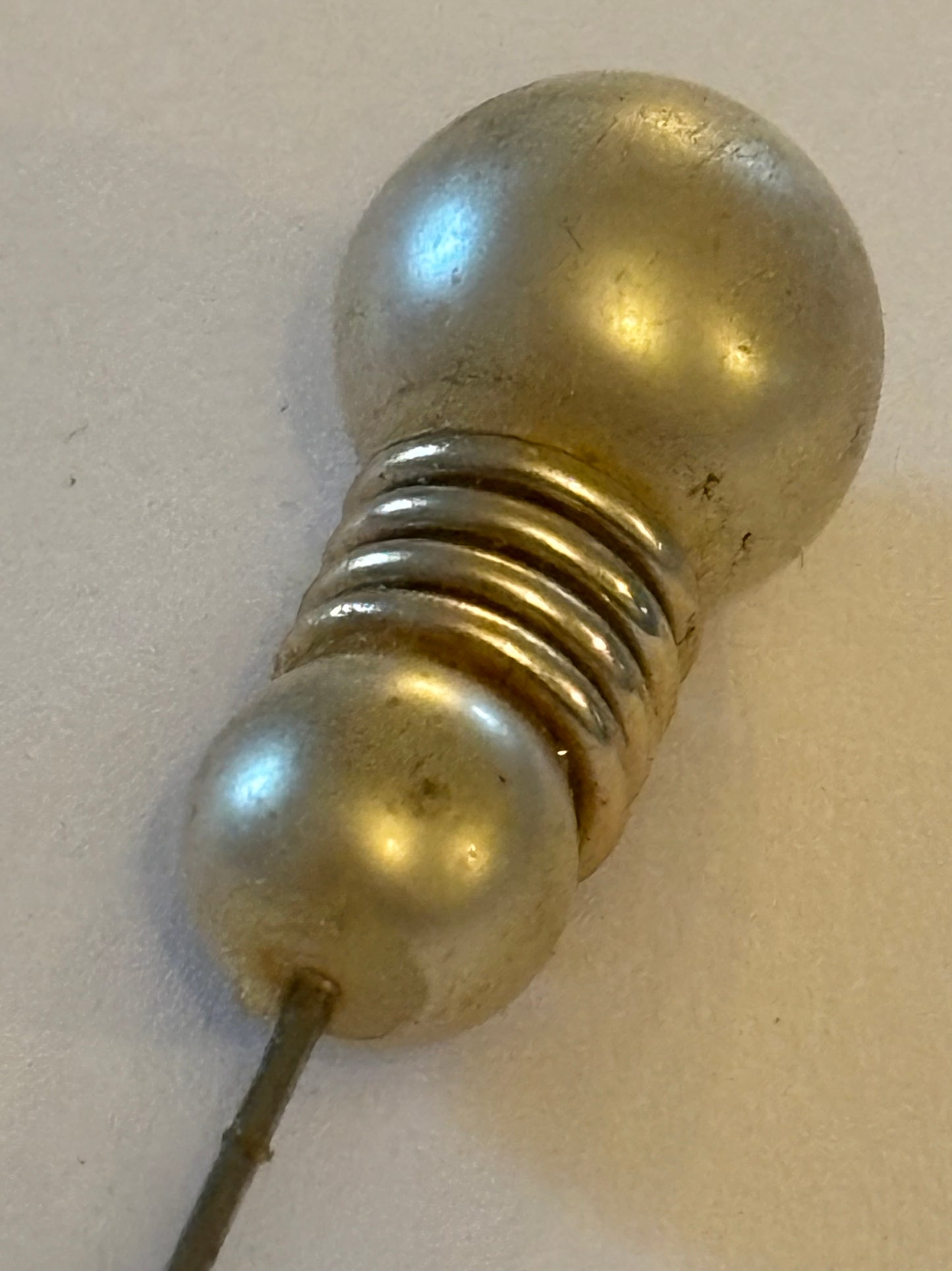 Pearlescent bead and coil hat pin