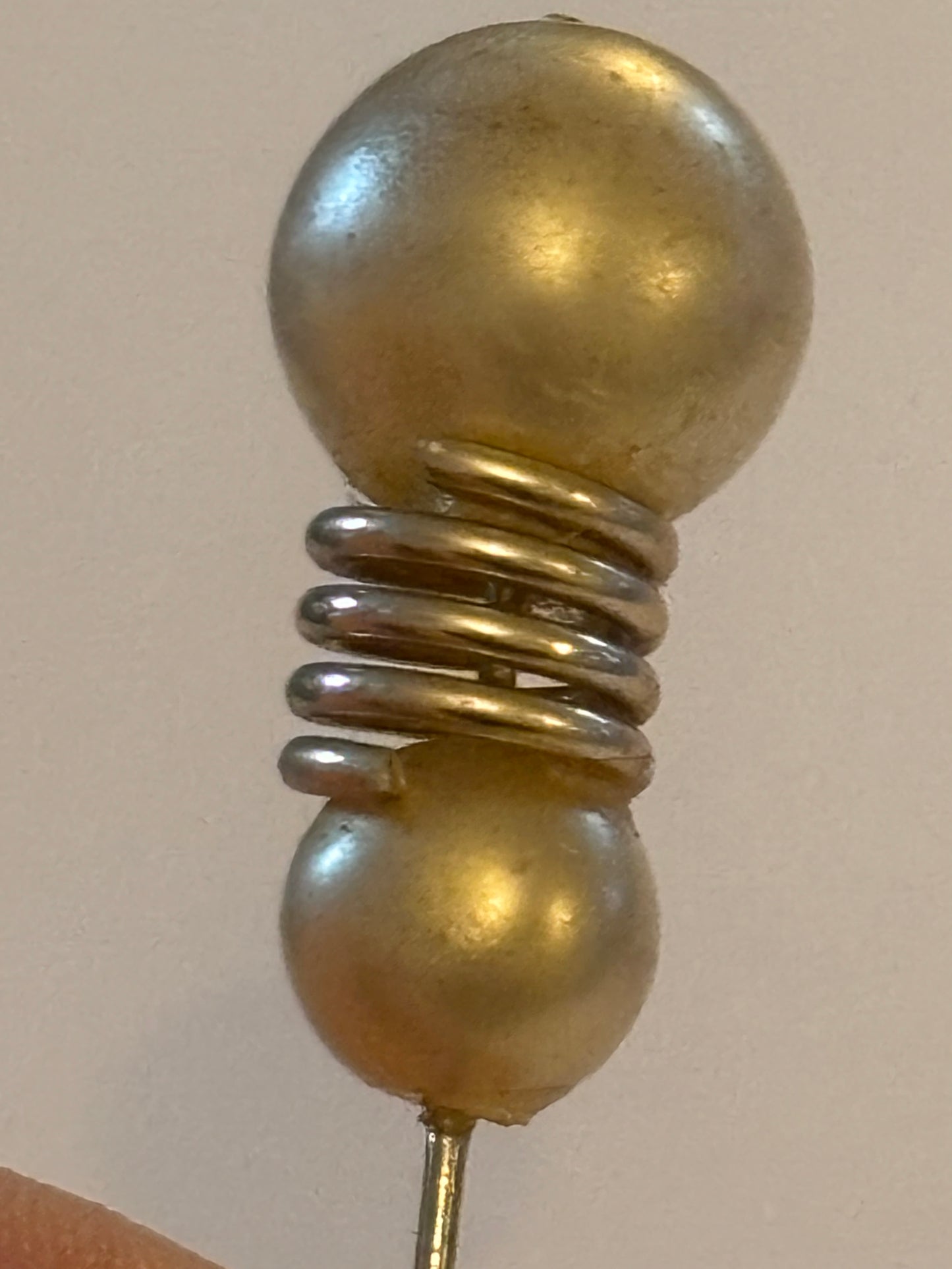 Pearlescent bead and coil hat pin