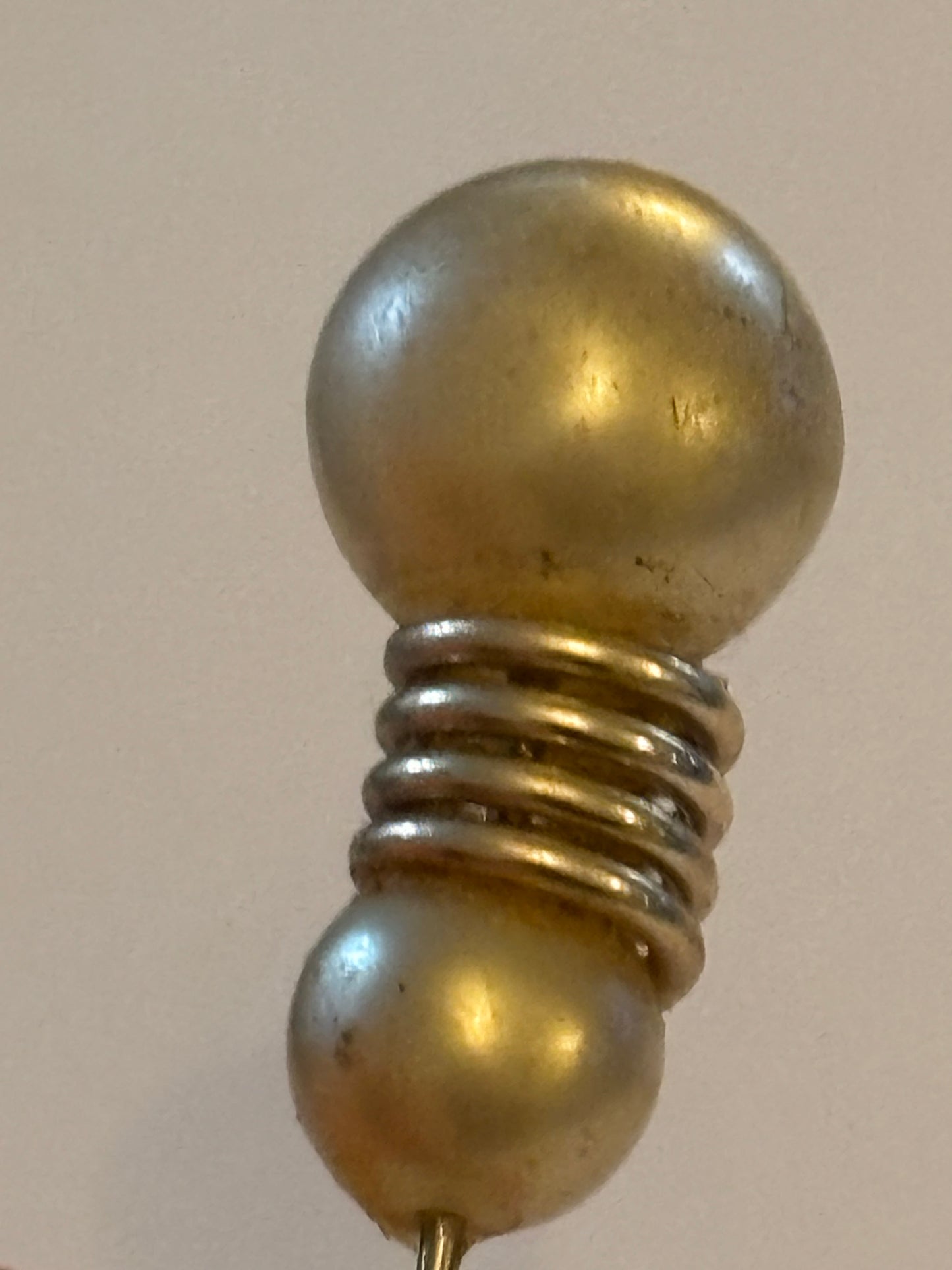 Pearlescent bead and coil hat pin