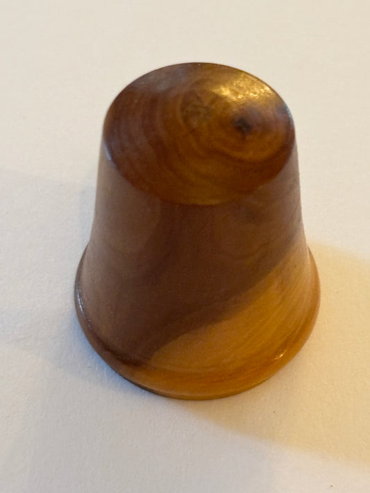 Light brown wooden solid thimble