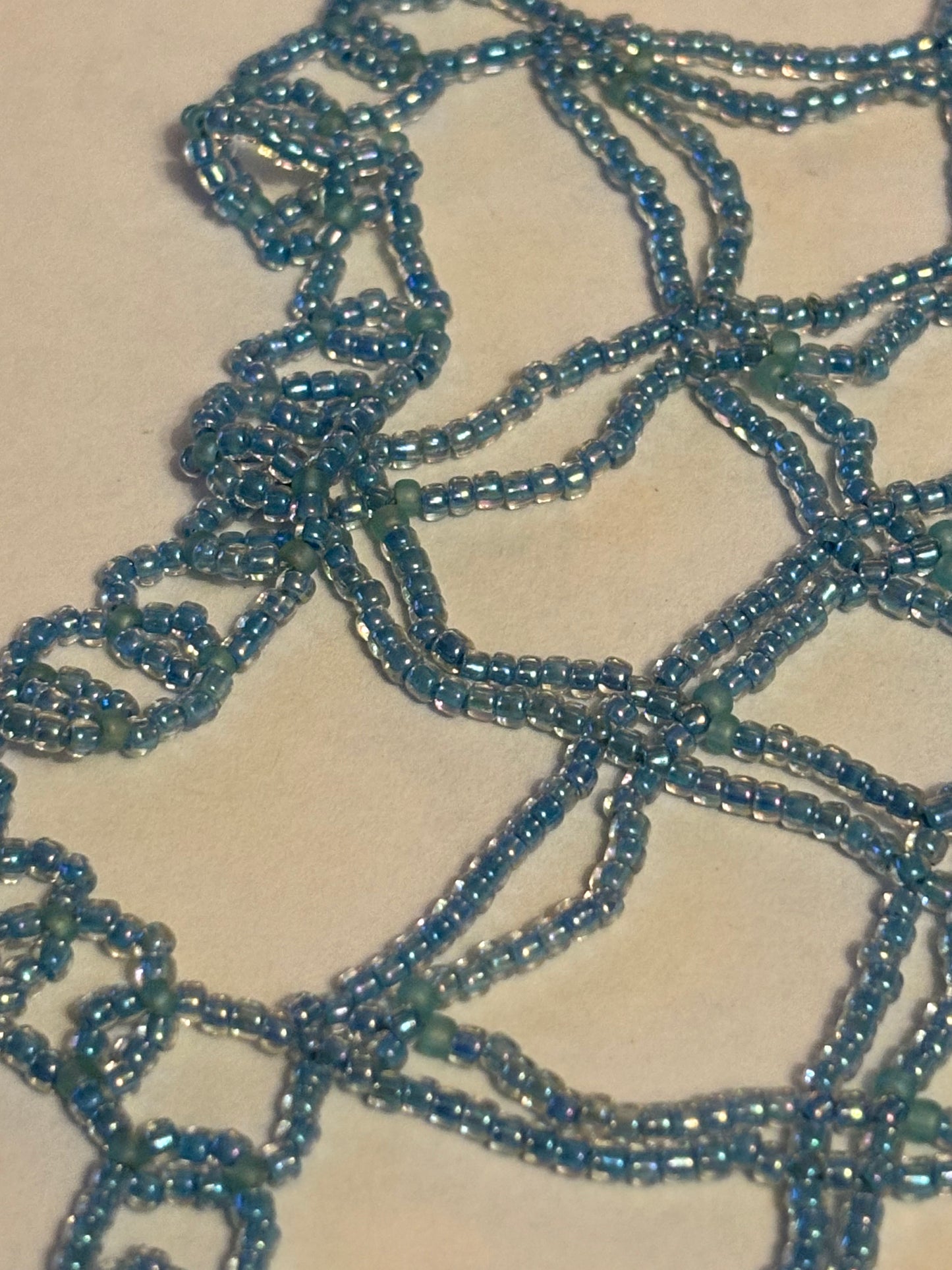 Tiny blue bead indian style doily