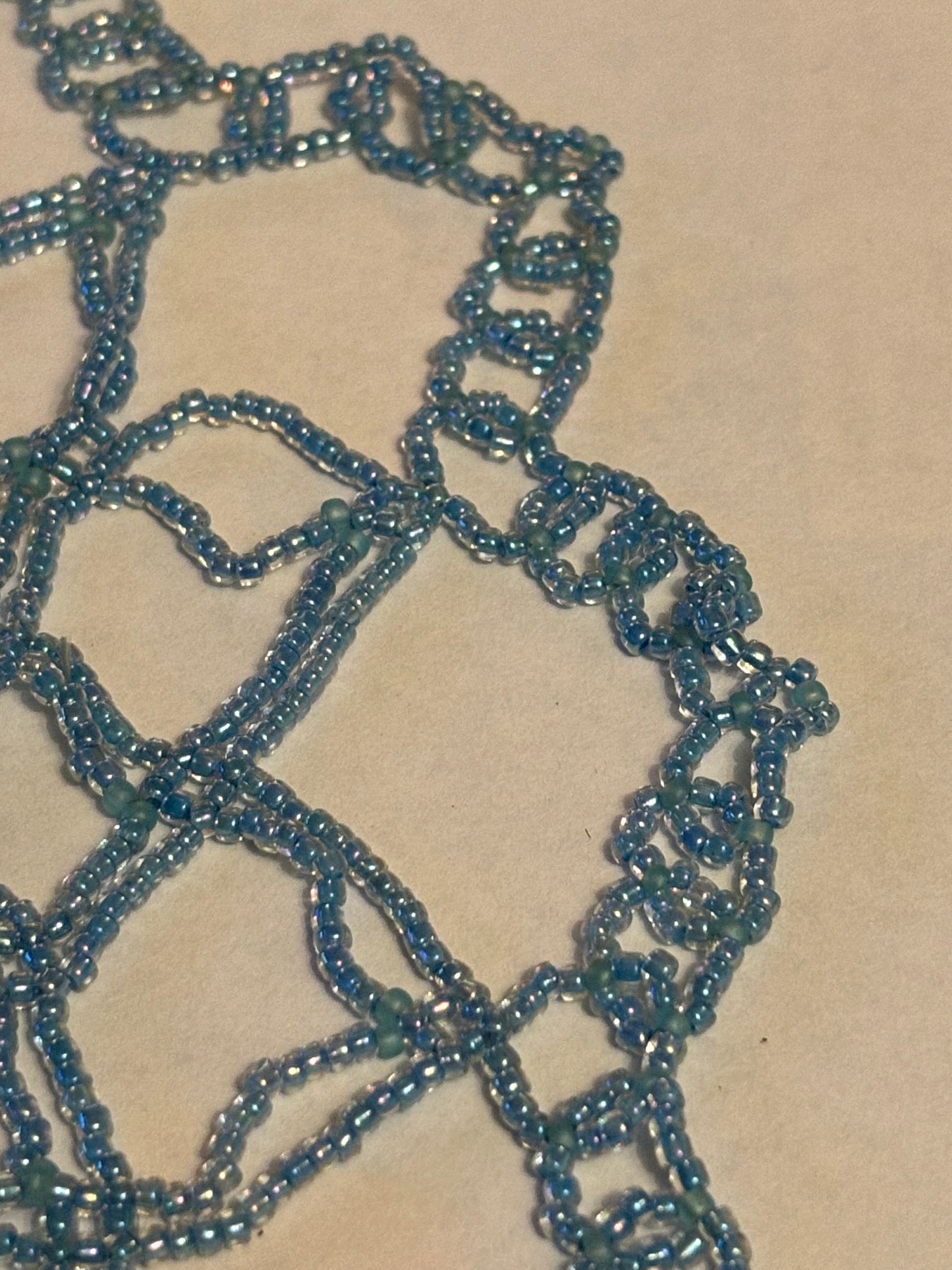 Tiny blue bead indian style doily