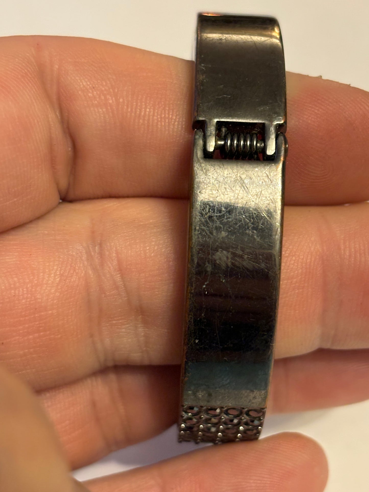 Dark Metal Spring Bangle with panel of dark diamantes