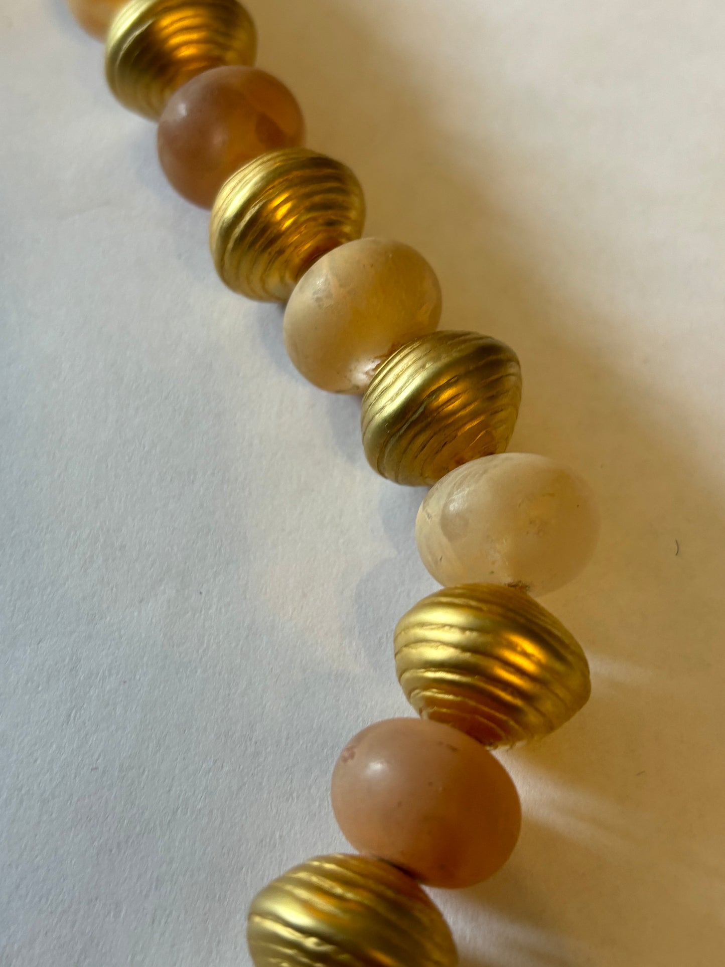 Large long gold and peach bead necklace