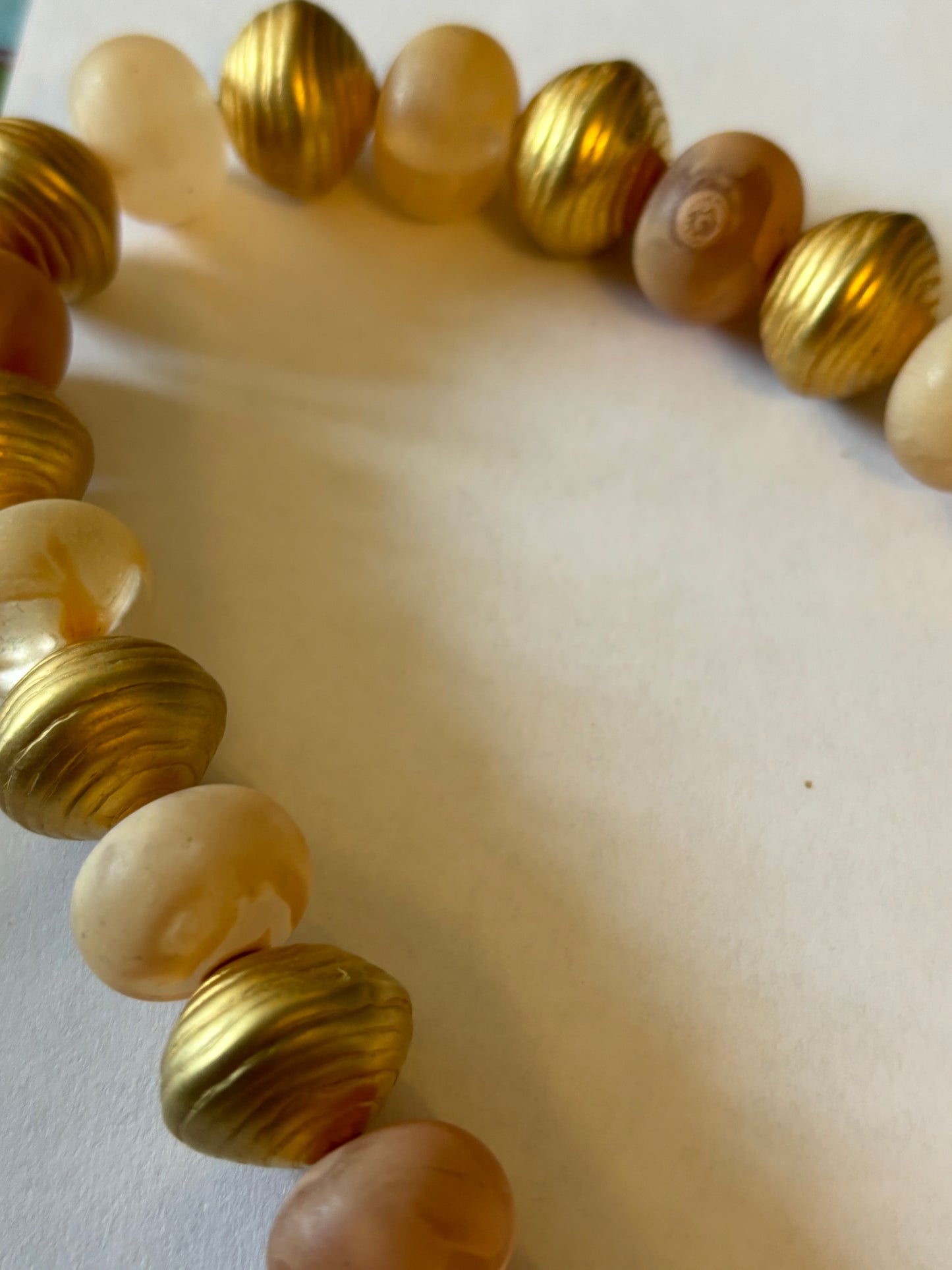 Large long gold and peach bead necklace