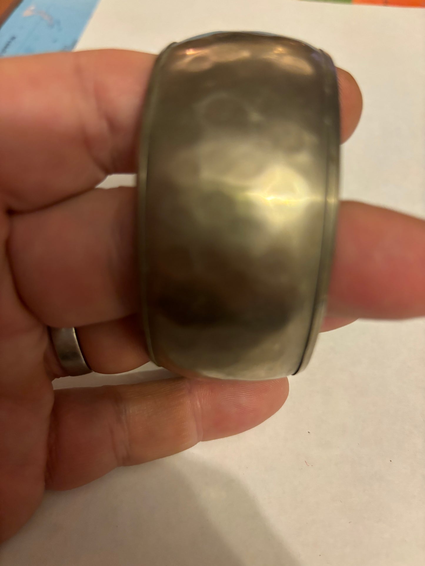 Silver metal wide bangle with light hammered pattern