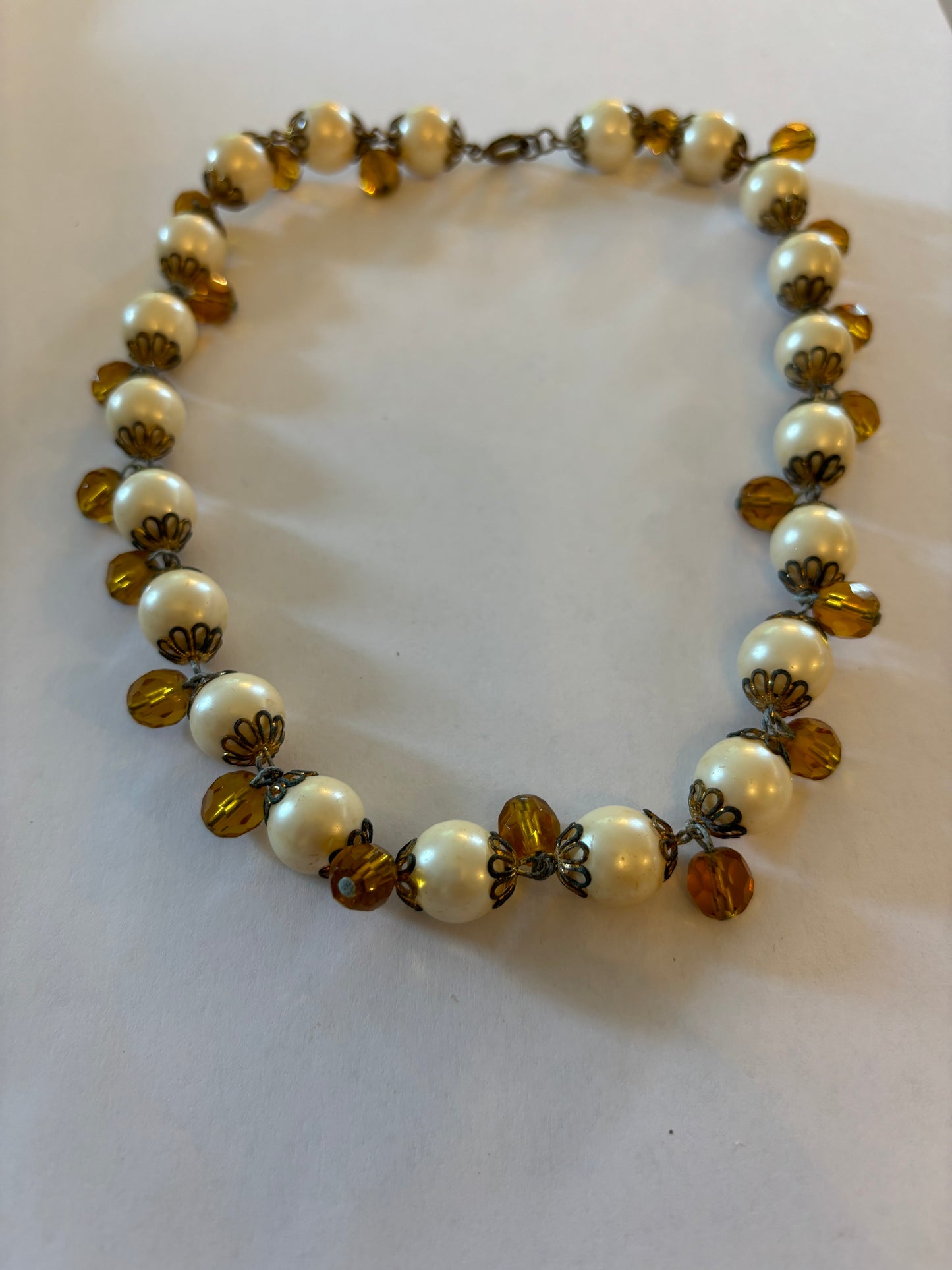 Pearl style and gold bead ornate necklace