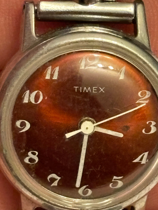 Small Timex Ladies Manual silver watch with red dial - Untested