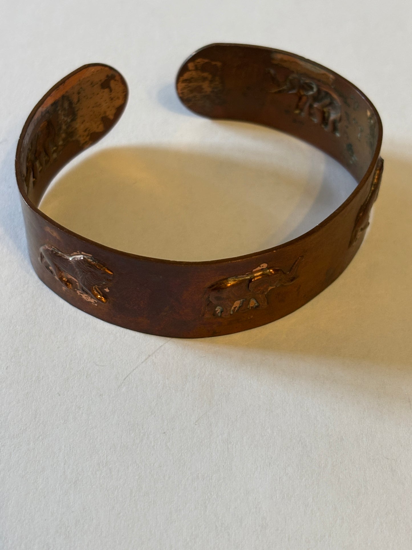 Copper open bangle with Elephants and Lions