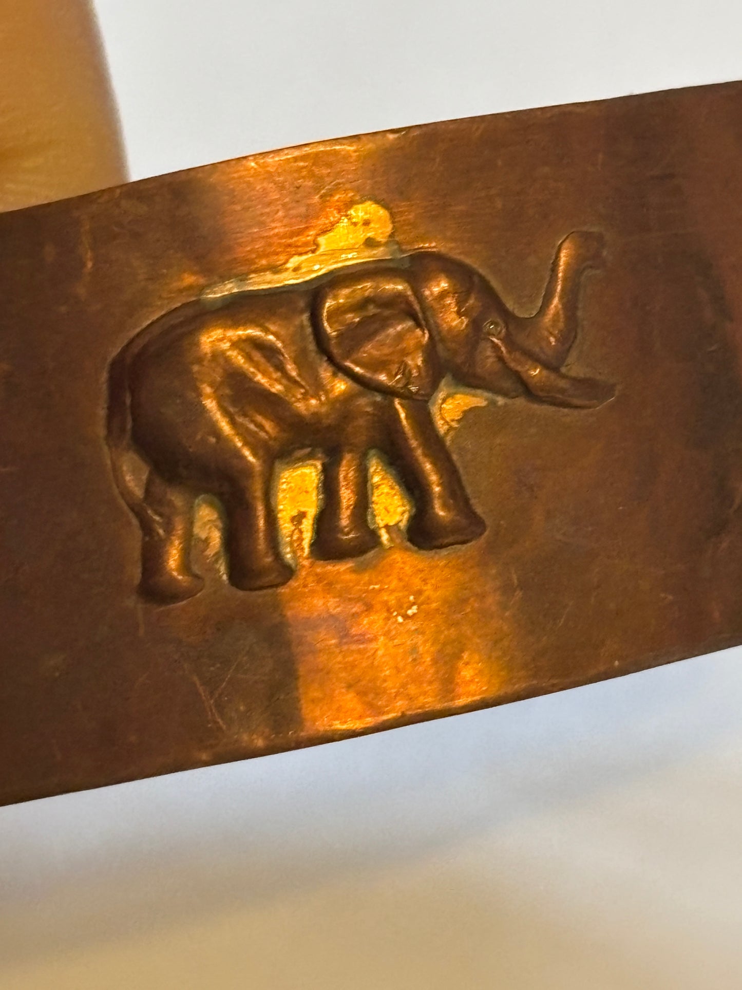 Copper open bangle with Elephants and Lions