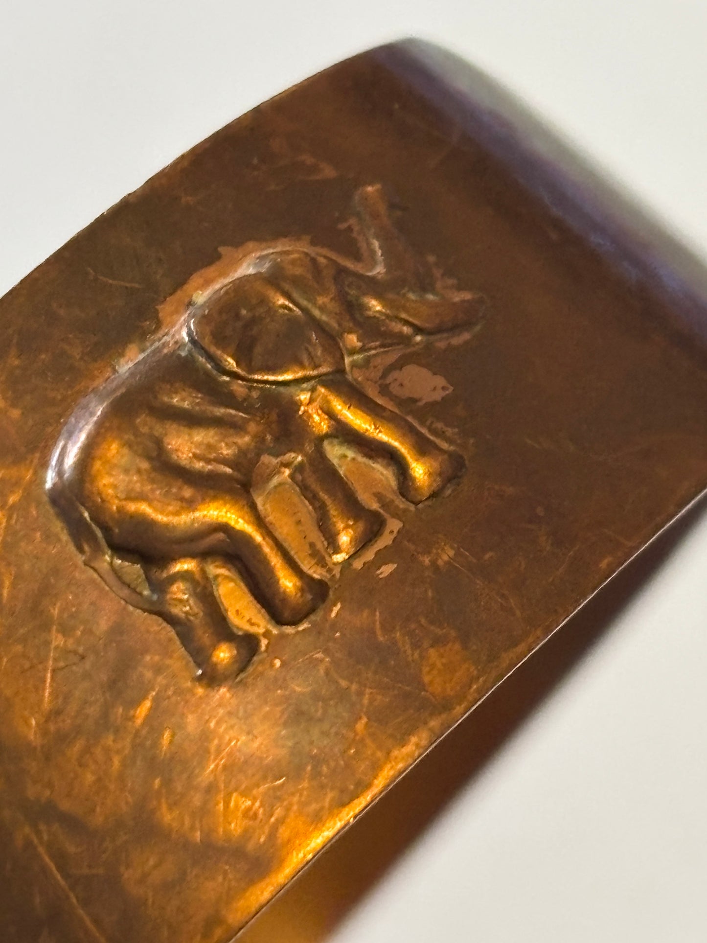 Copper open bangle with Elephants and Lions