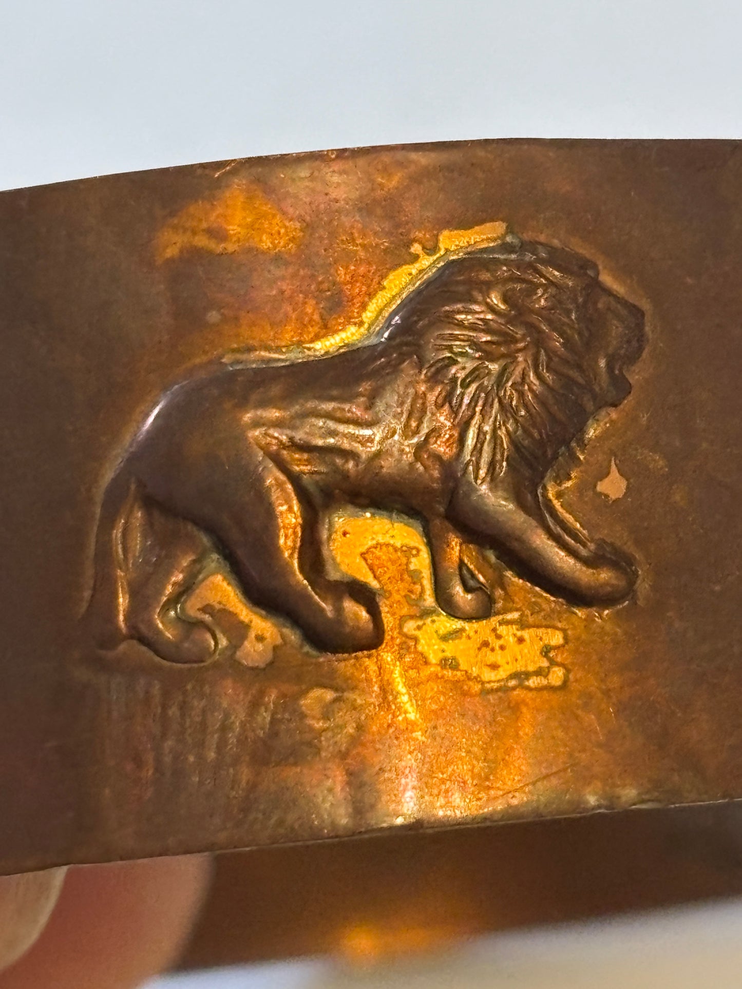 Copper open bangle with Elephants and Lions