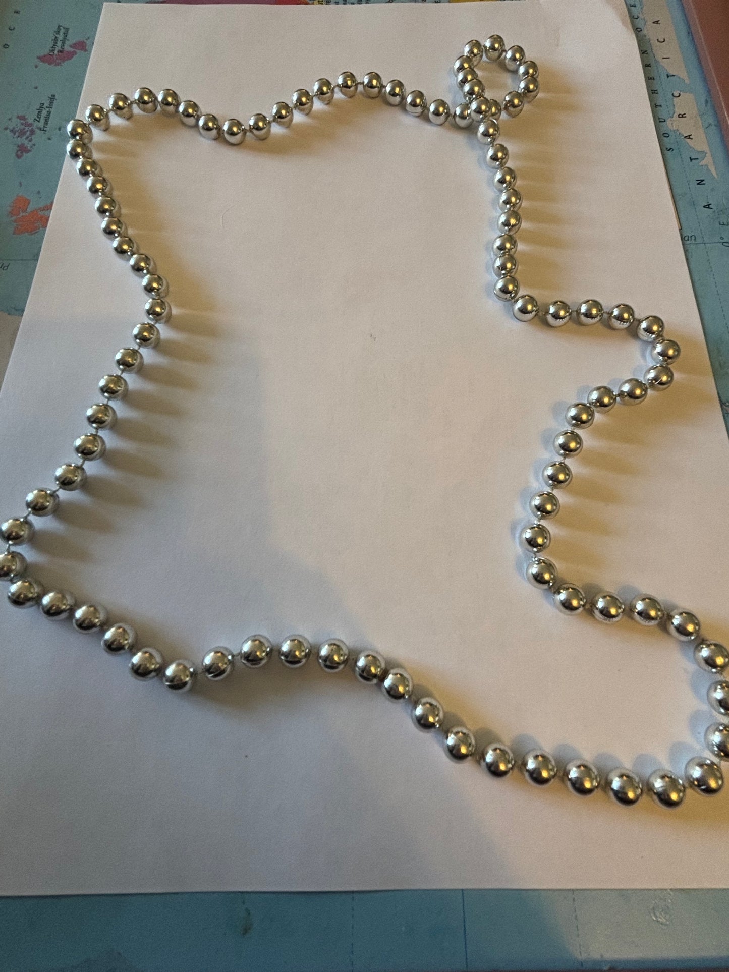 Long silver bead necklace