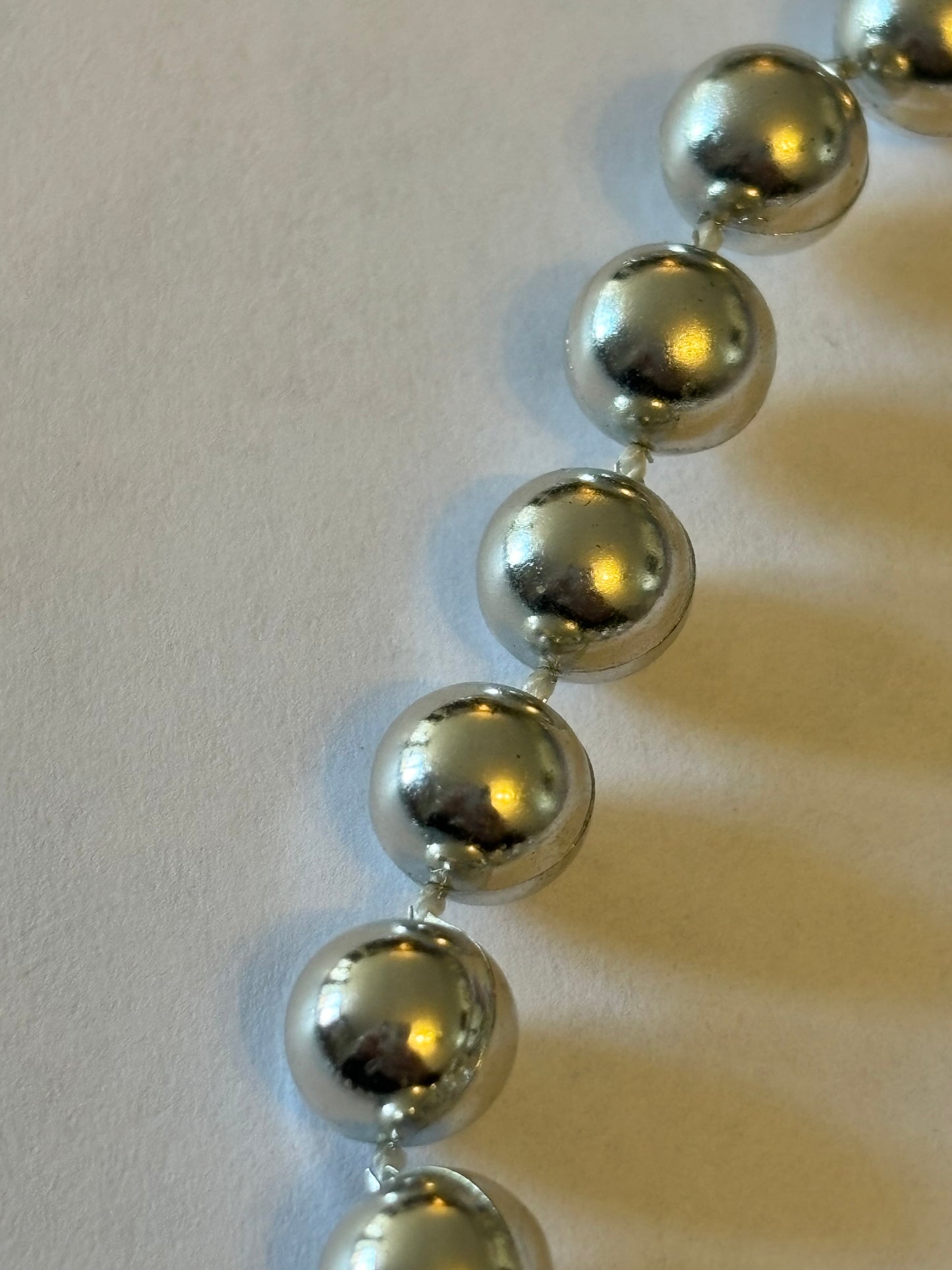 Long silver bead necklace