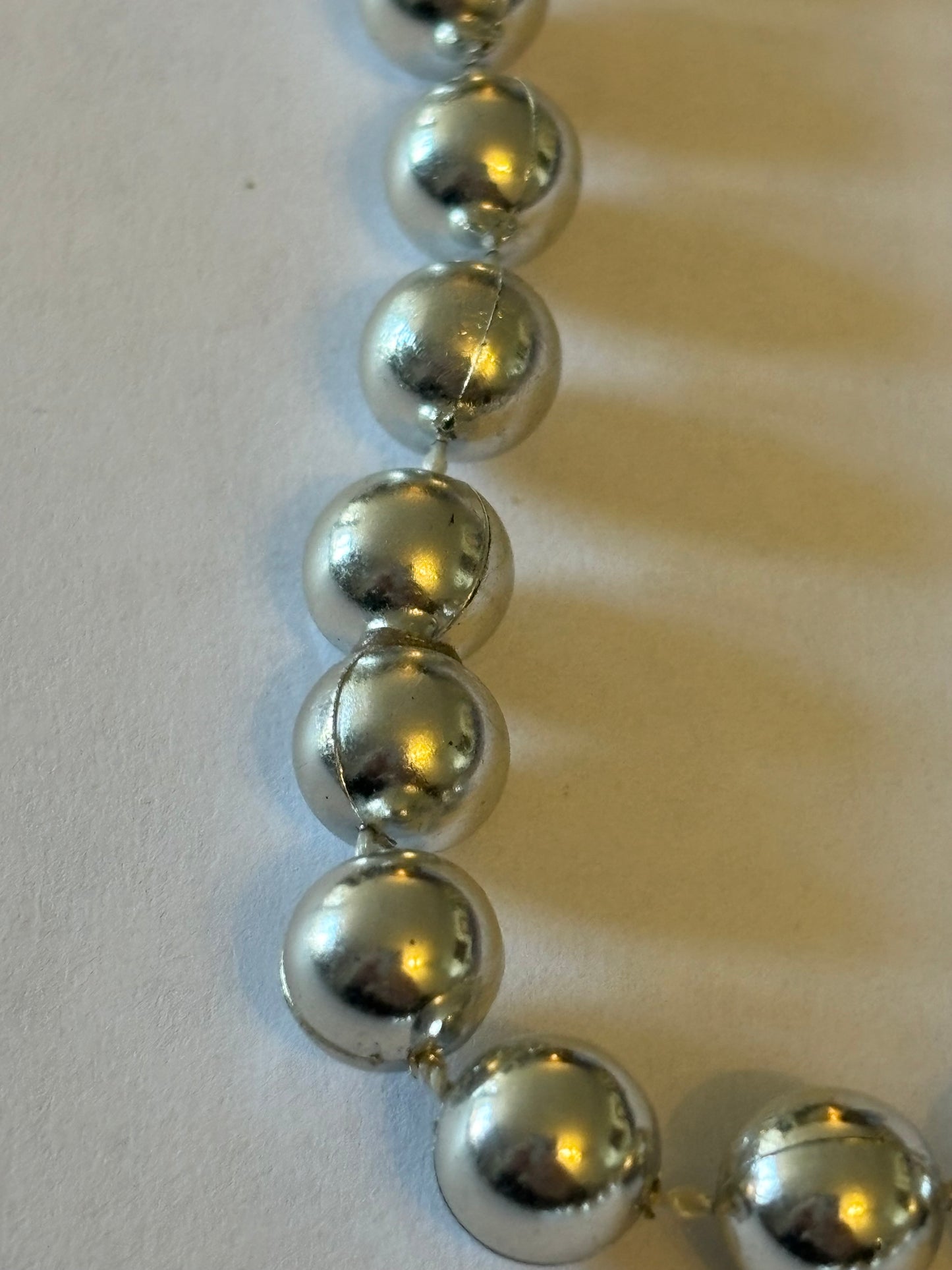 Long silver bead necklace