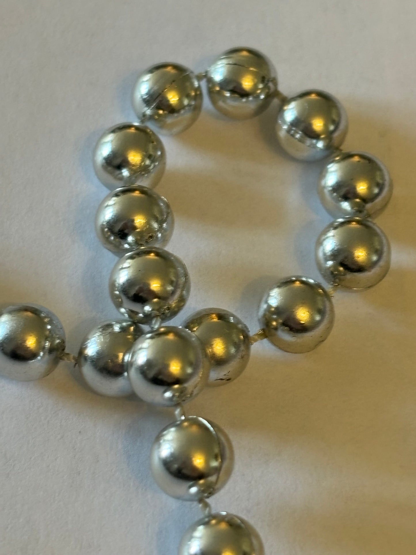 Long silver bead necklace