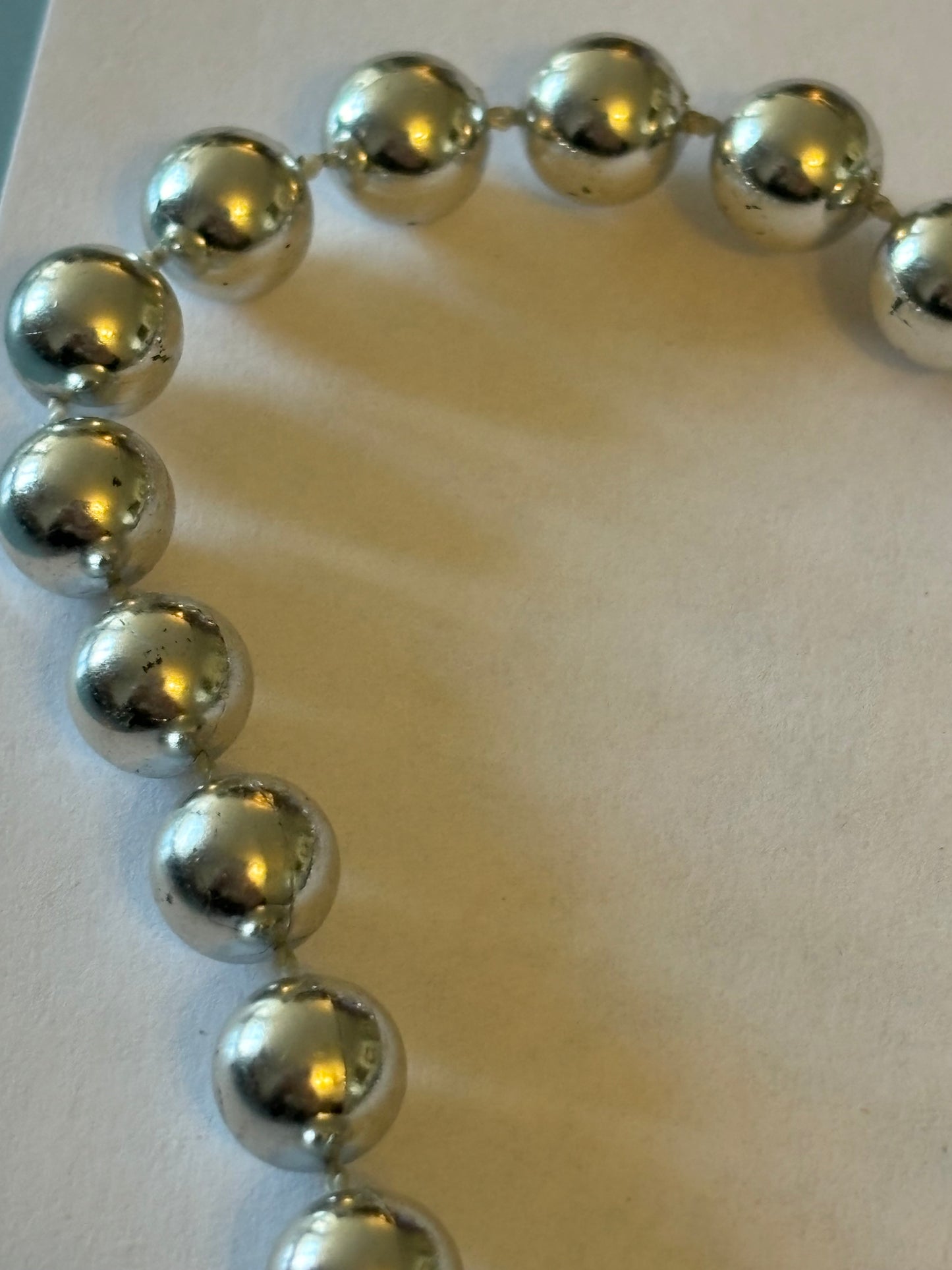 Long silver bead necklace