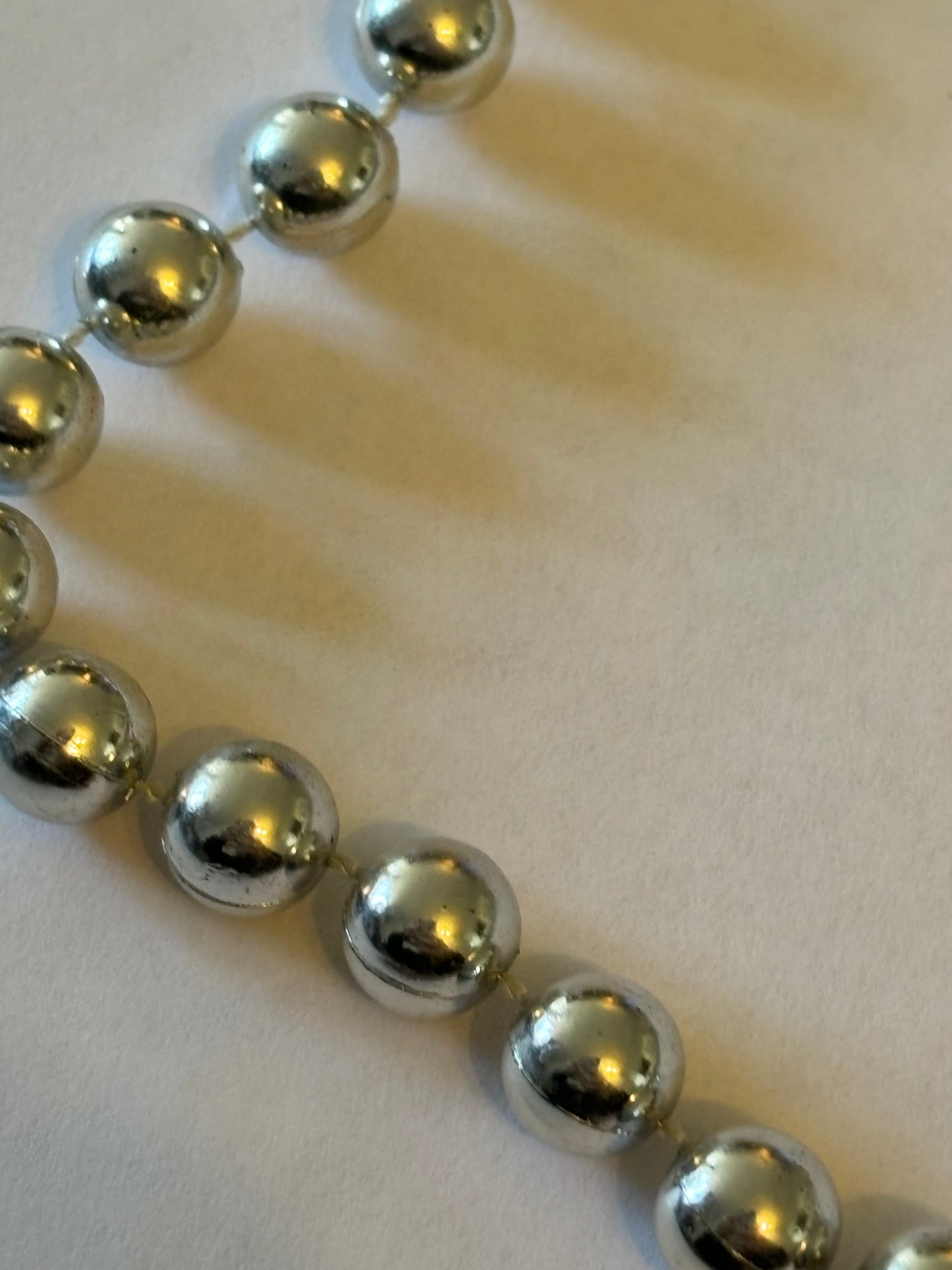 Long silver bead necklace