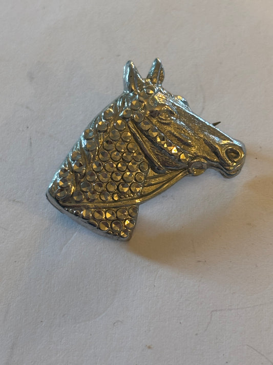 Silver horse head brooch