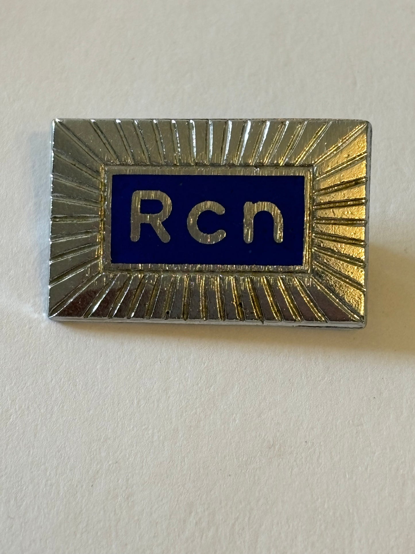 Silver and Blue metal RCN badge